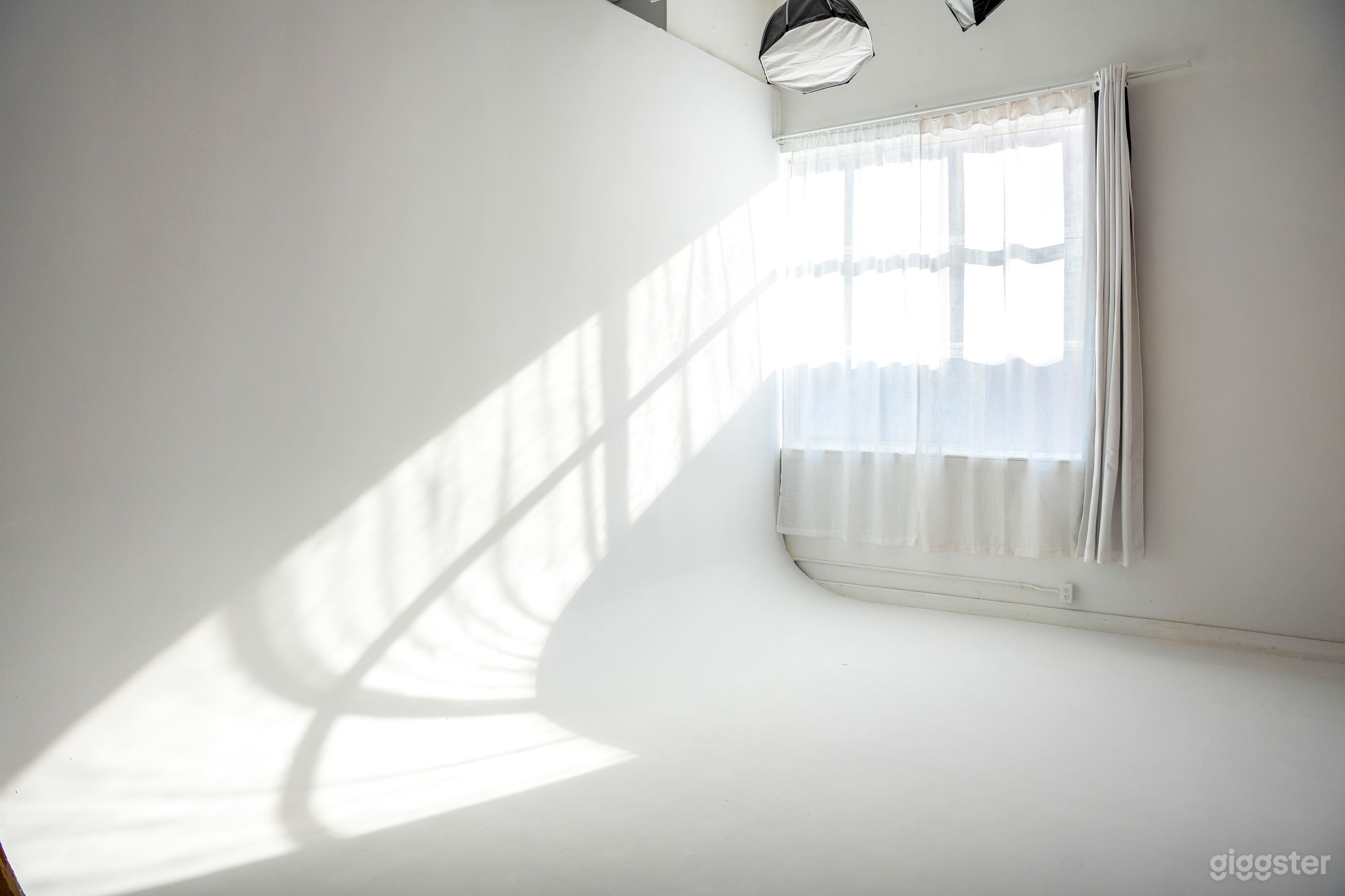 White Cyclorama Studio • Natural Light, High-Ceiling Loft Photo 2