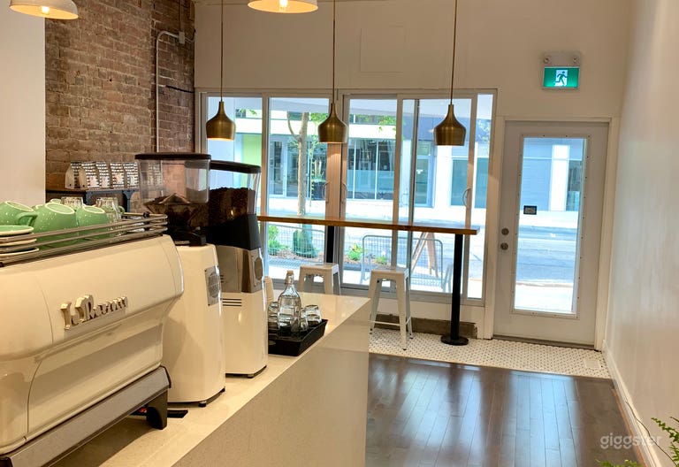  Bright Modern Cafe with Vibrant Murals and Patio 