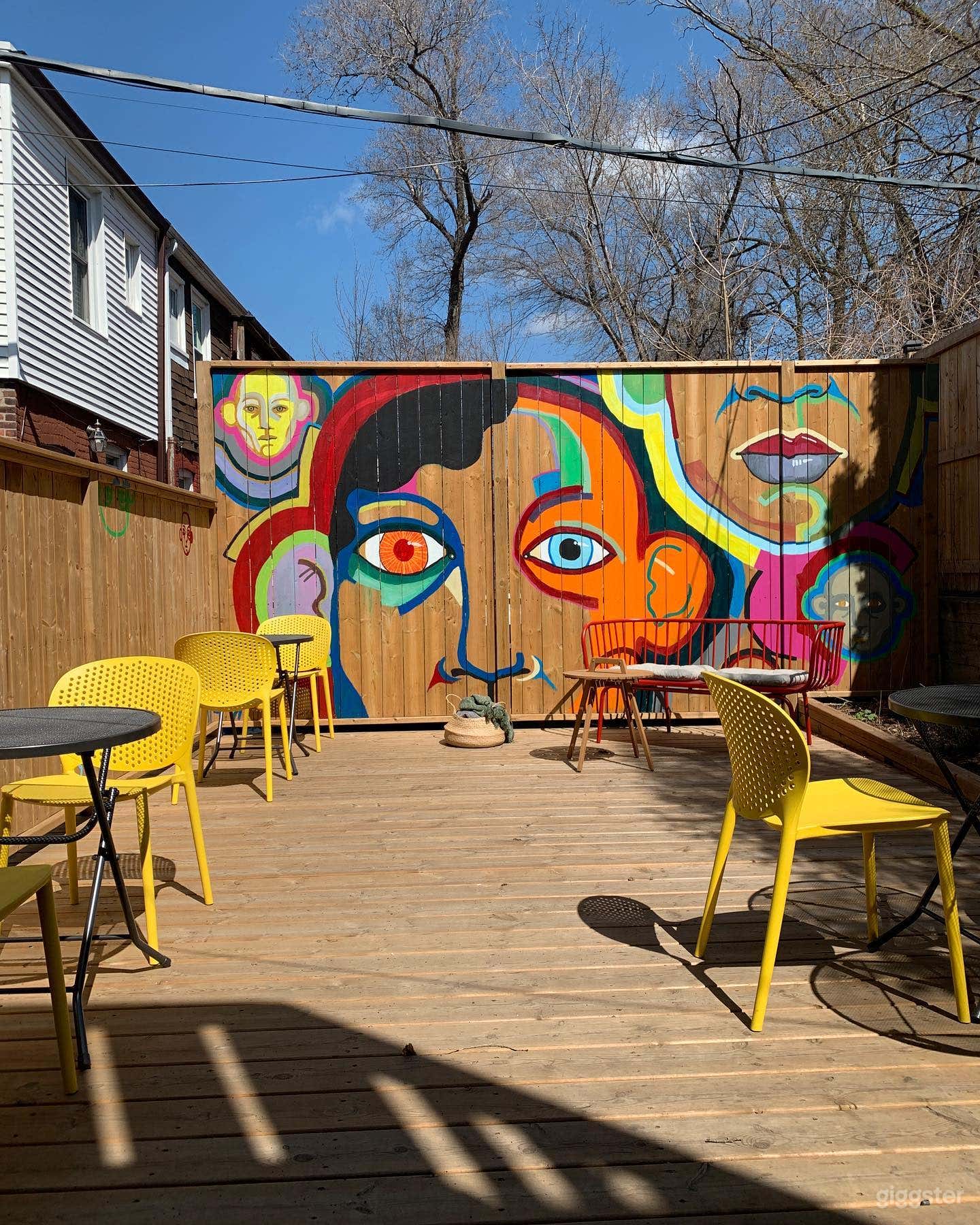 Bright, private garden patio with colourful murals