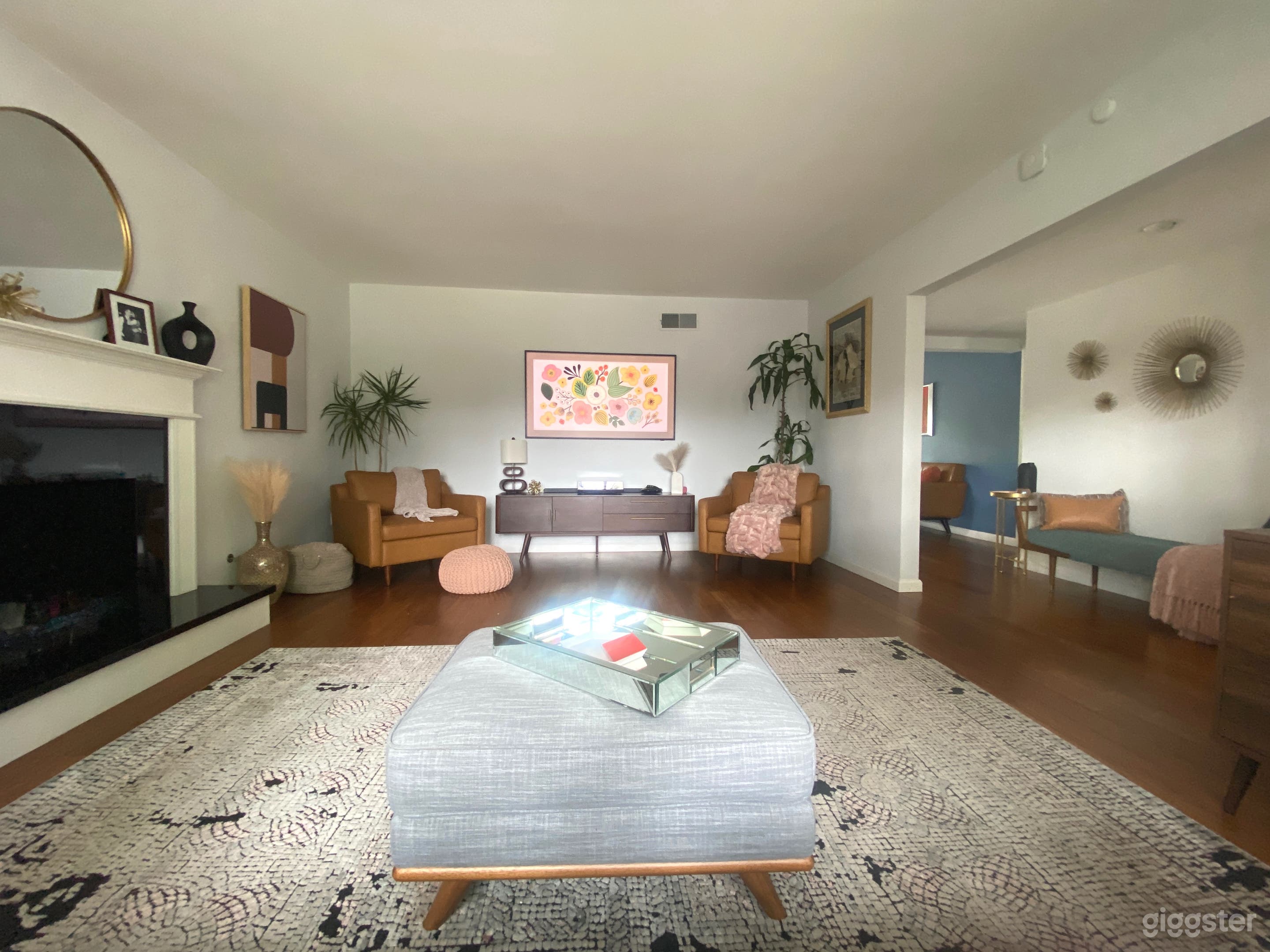 Main living room, leading into entryway and into dining/ party area. 