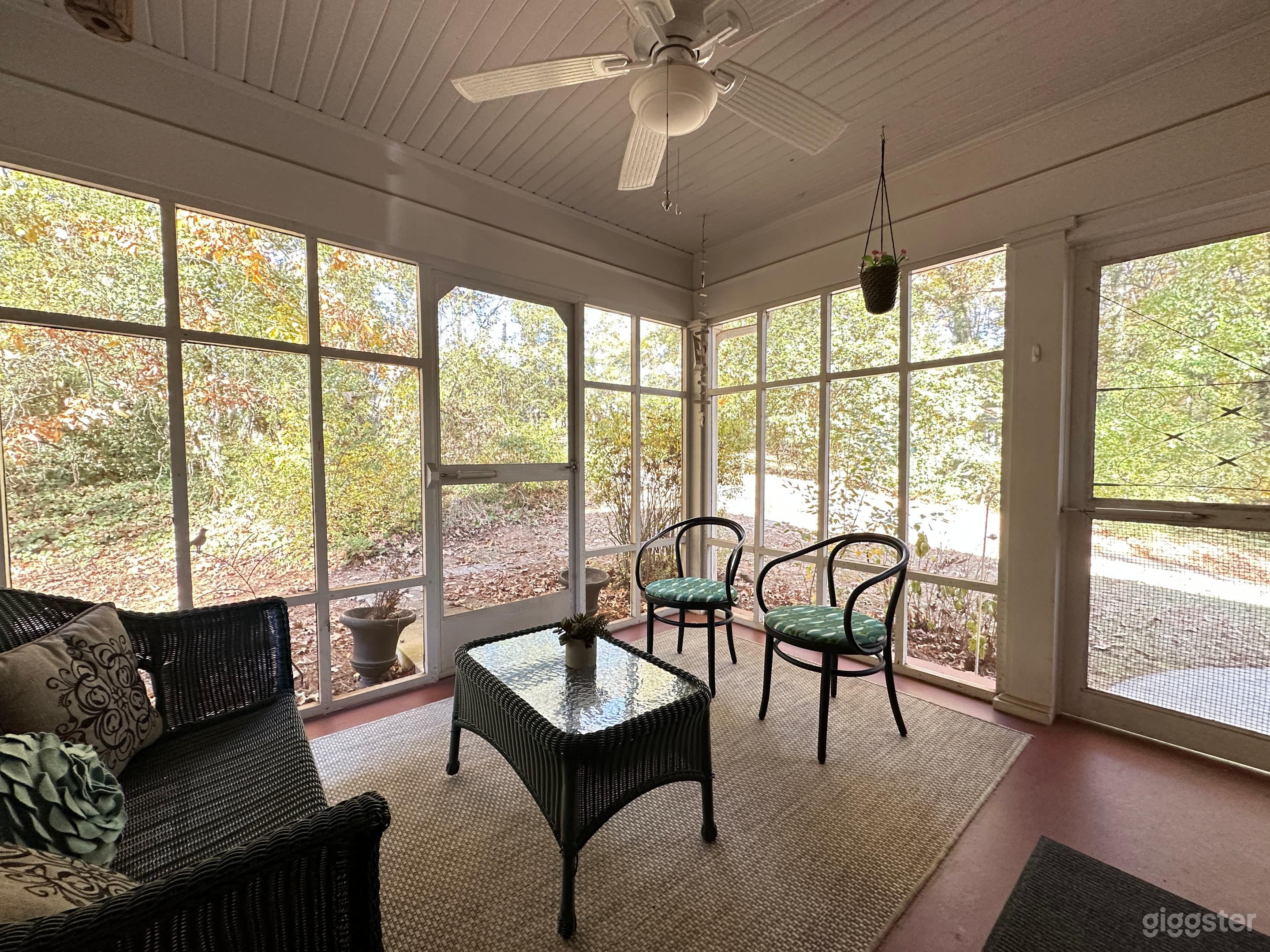 Inside screen porch looking towards the driveway