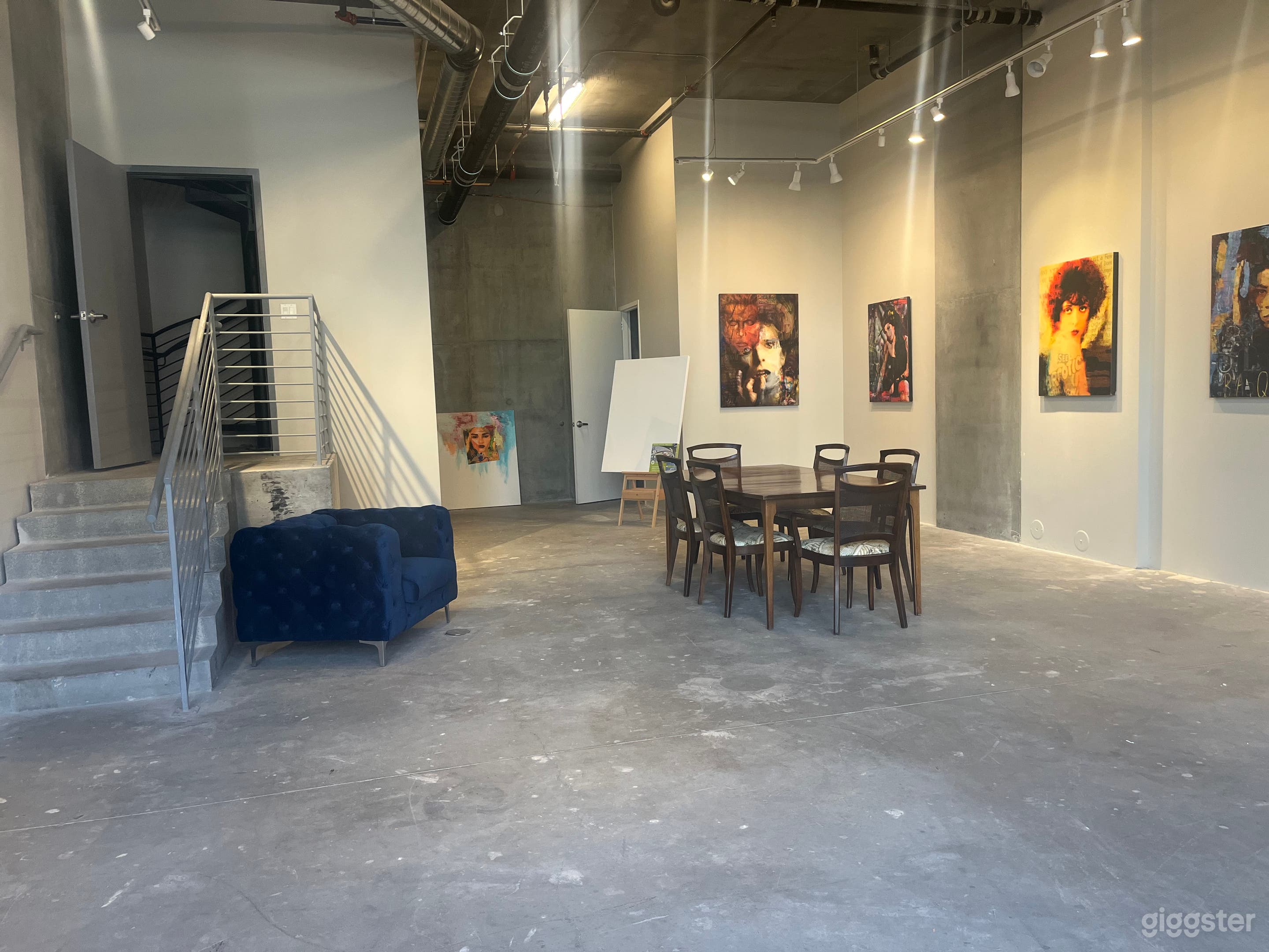 Creative contemporary industrial event space. It could be used as an art gallery as show or music venue or any other creative Endless possibilities are available for the space. Track lighting surrounds the 12 foot ceilings.