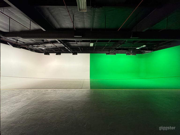  We use chroma-green paint and dead-flat sheen.  