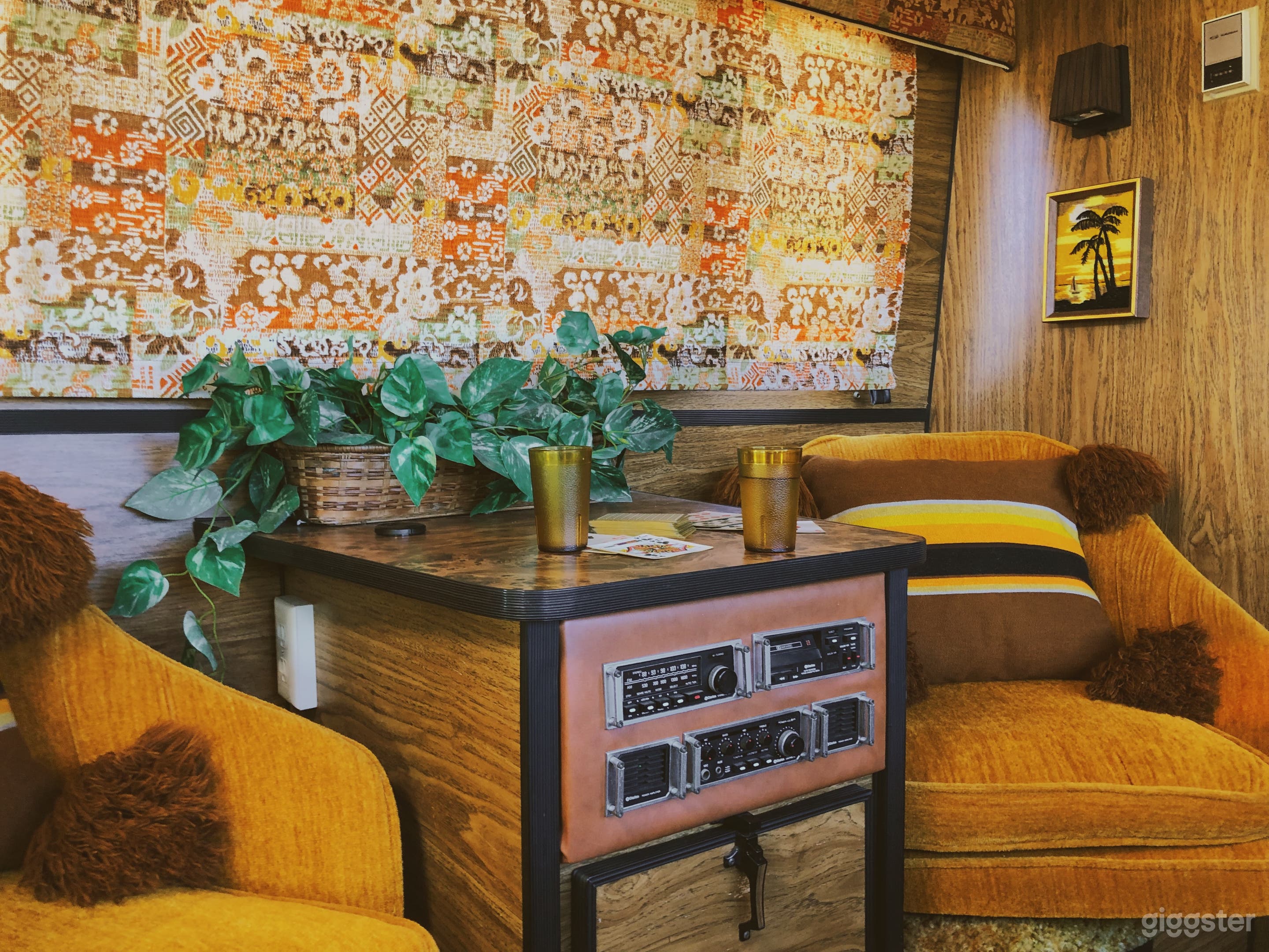 Orange velvet swivel seats and original 70's hifi stereo listening station