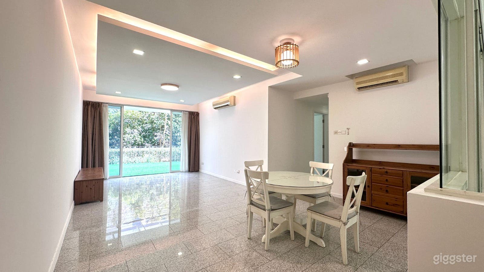 Condo Unit with Outdoor Patio facing Greenery Photo 1