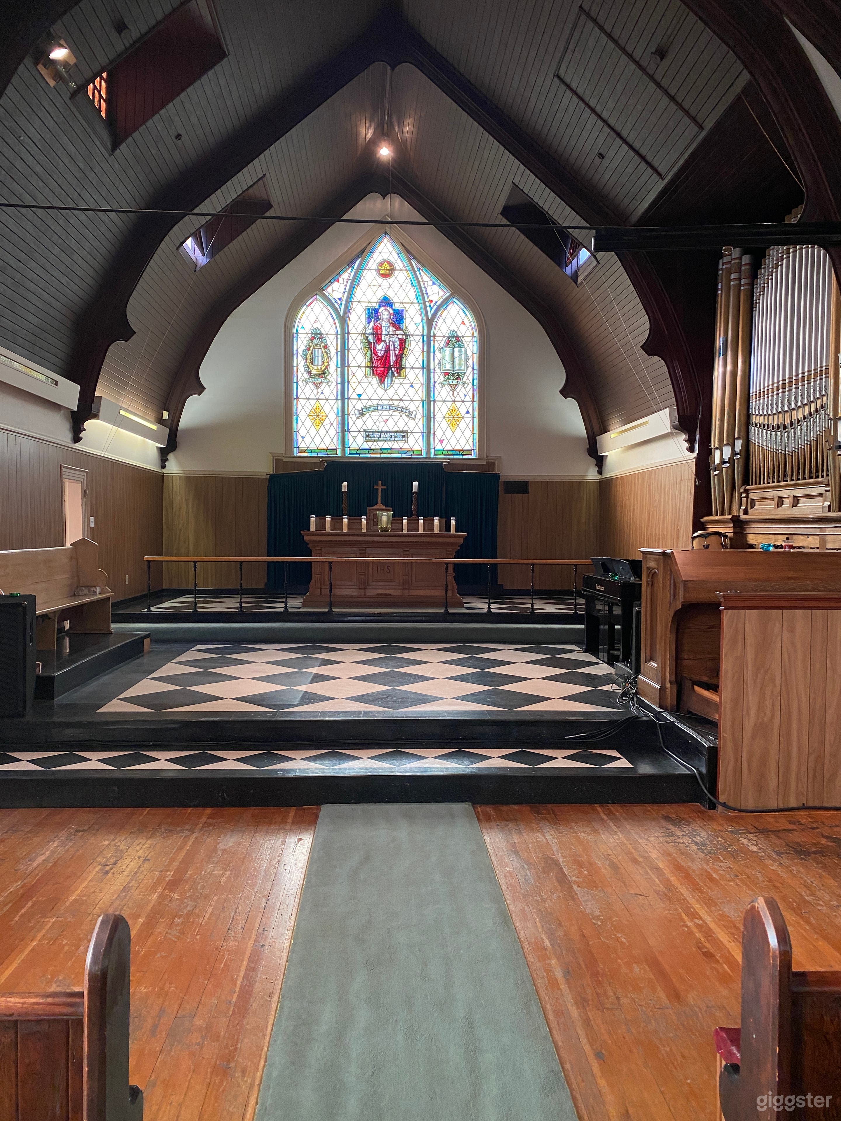 Historic Sanctuary with Stained Glass Windows Photo 2