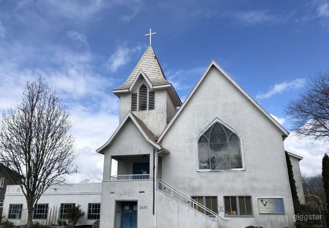 Historic Sanctuary with Stained Glass Windows Photo 4