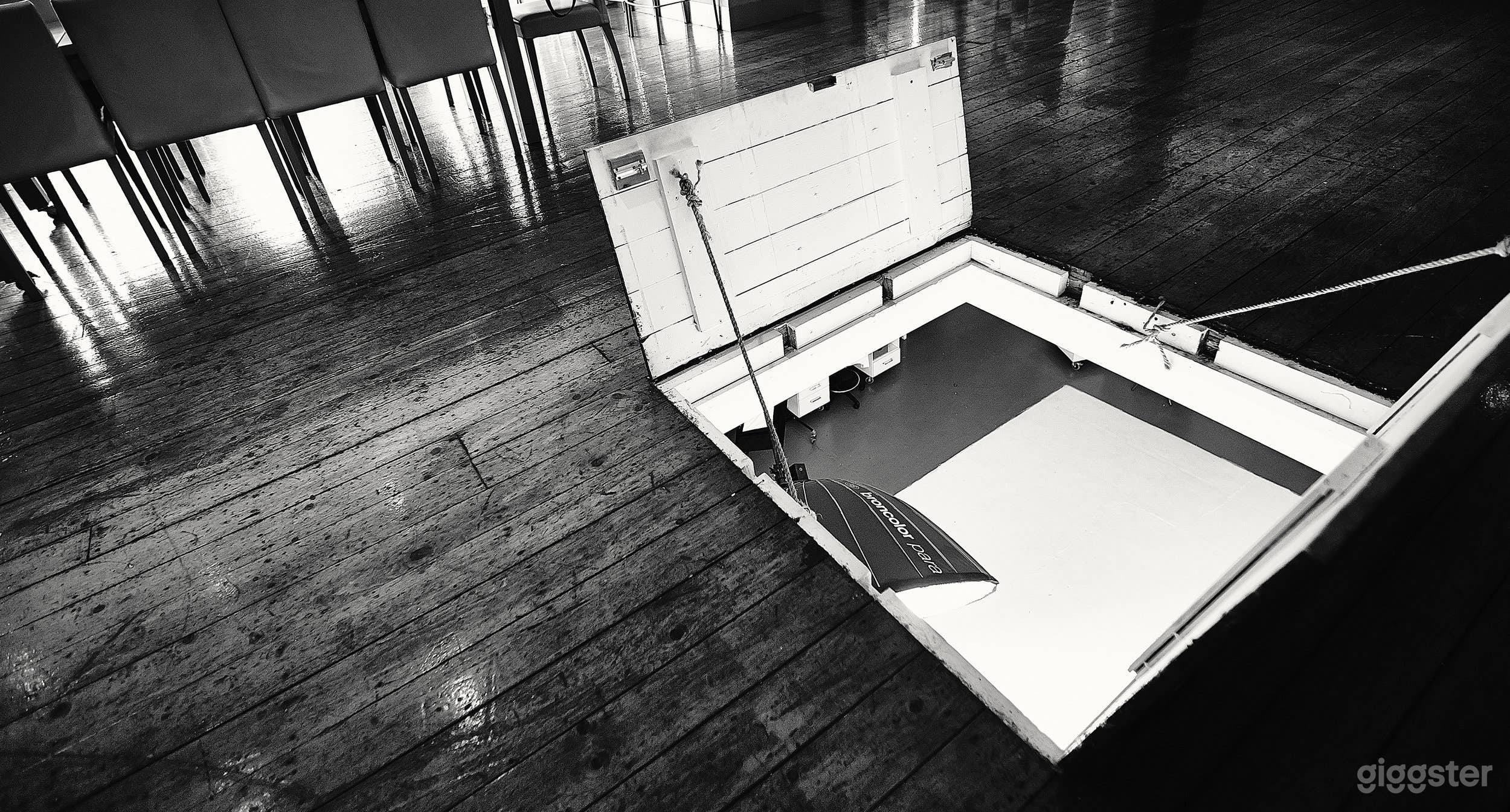 Trap door direct overhead view onto centre of studio floor