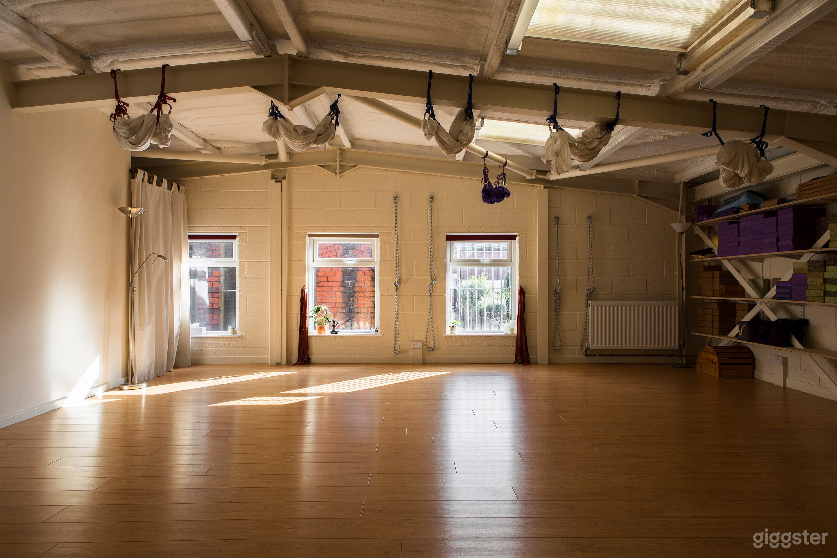 Back wall with 3 east facing windows