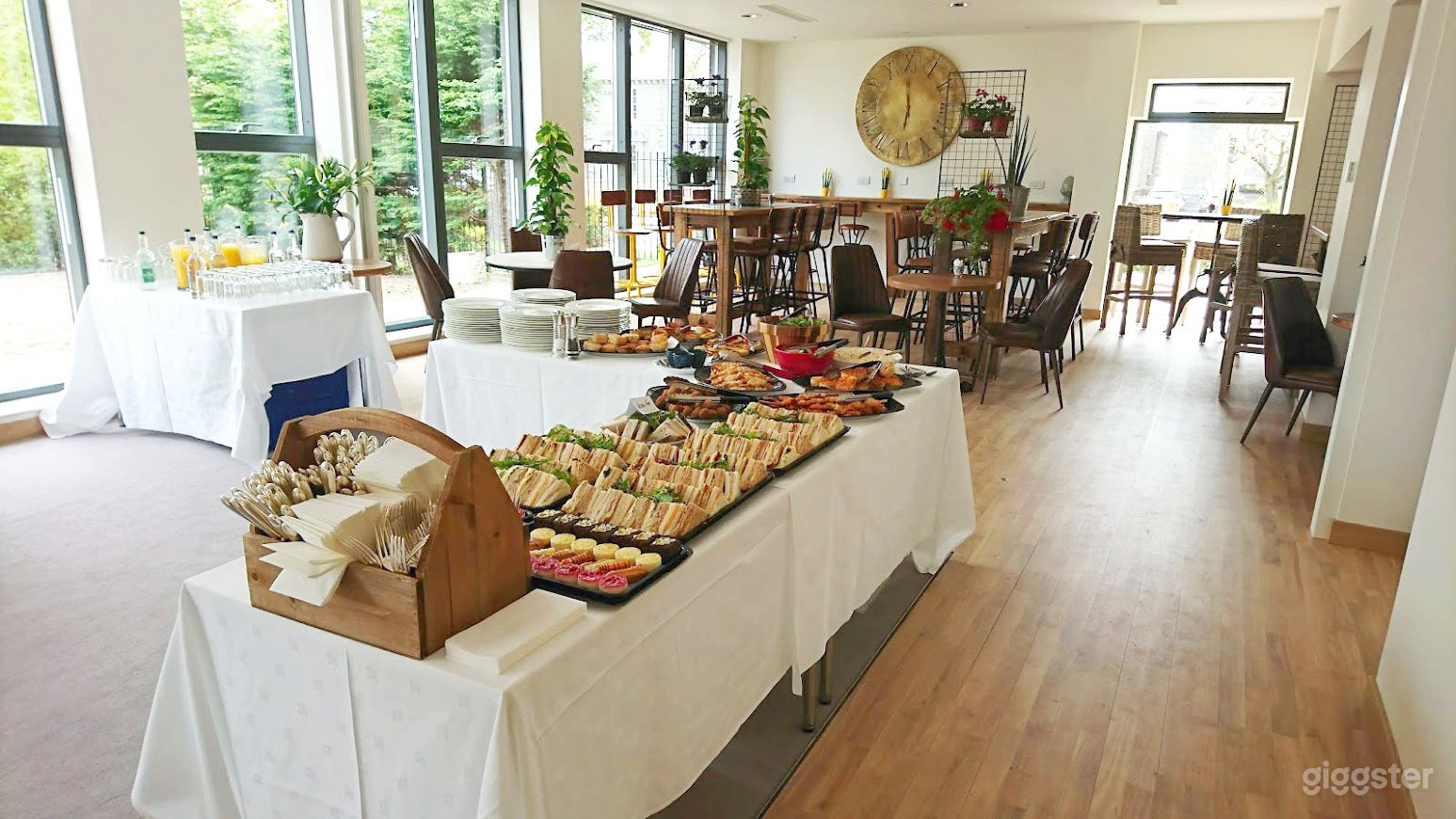 Garden room with removable wall off, connecting the garden room to the coffee house space. Buffet provided by the onsite coffee house.