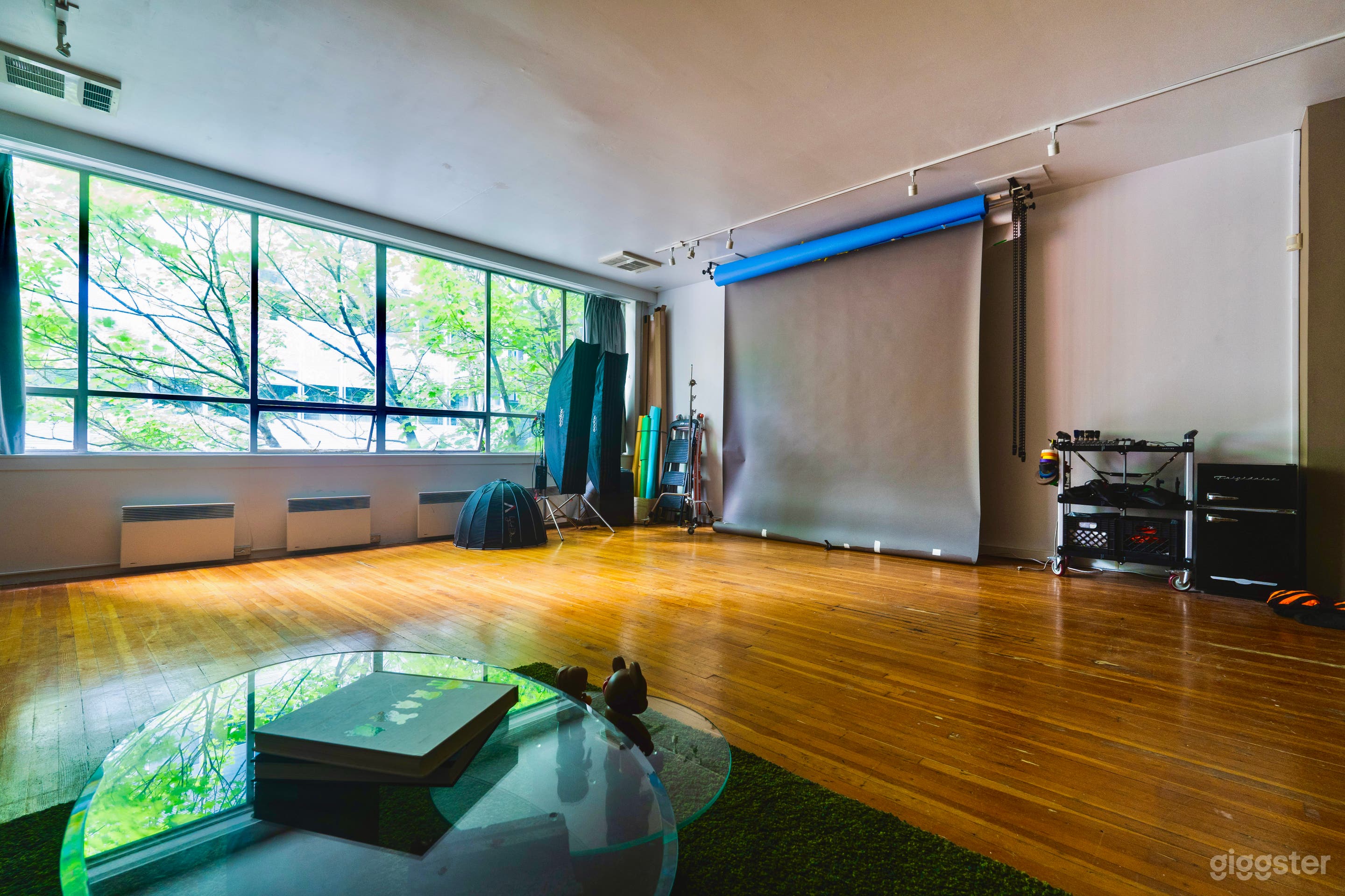 Studio space, with backdrop and equipment.