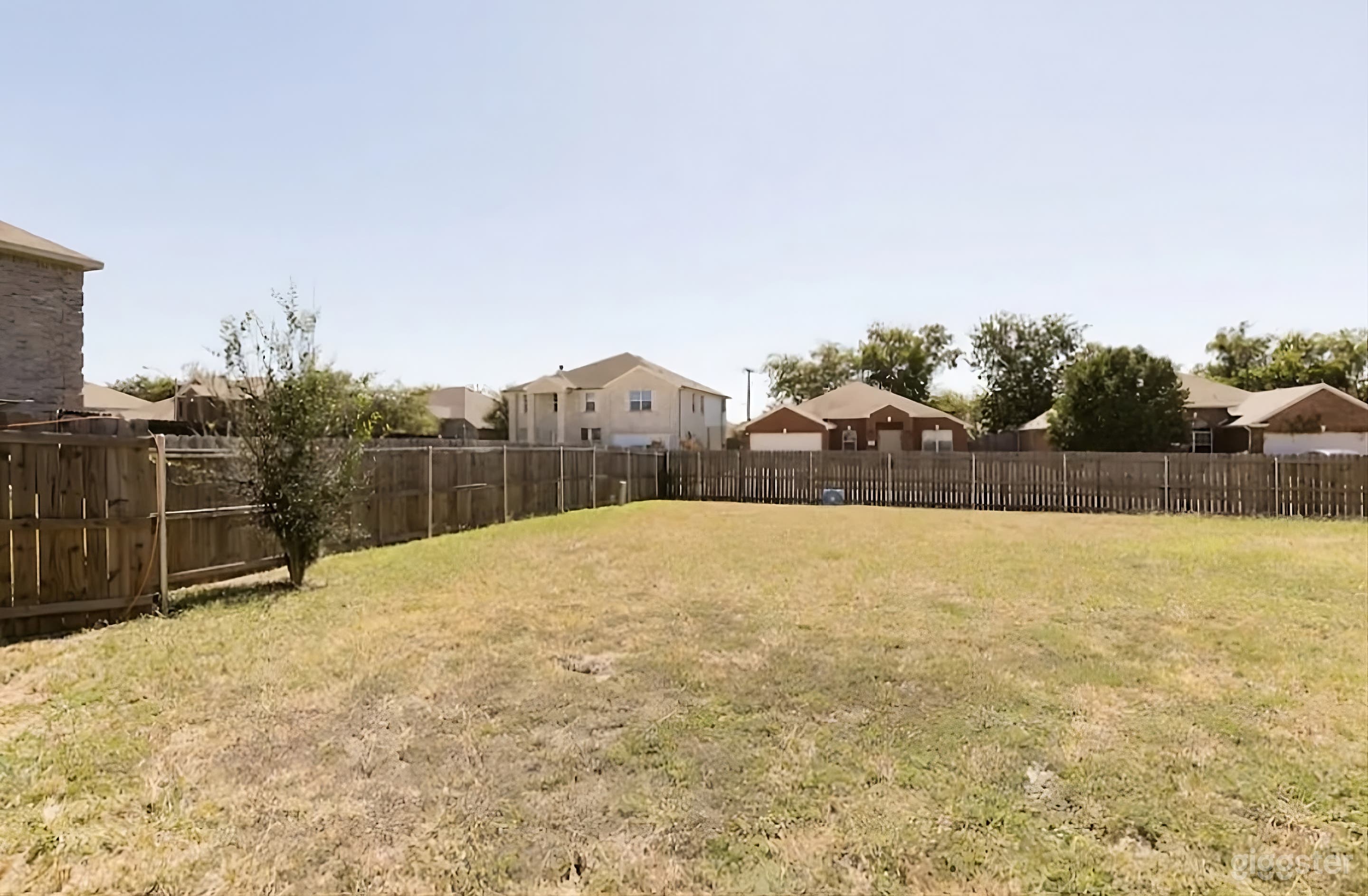 Spacious Fenced Backyard Photo 3