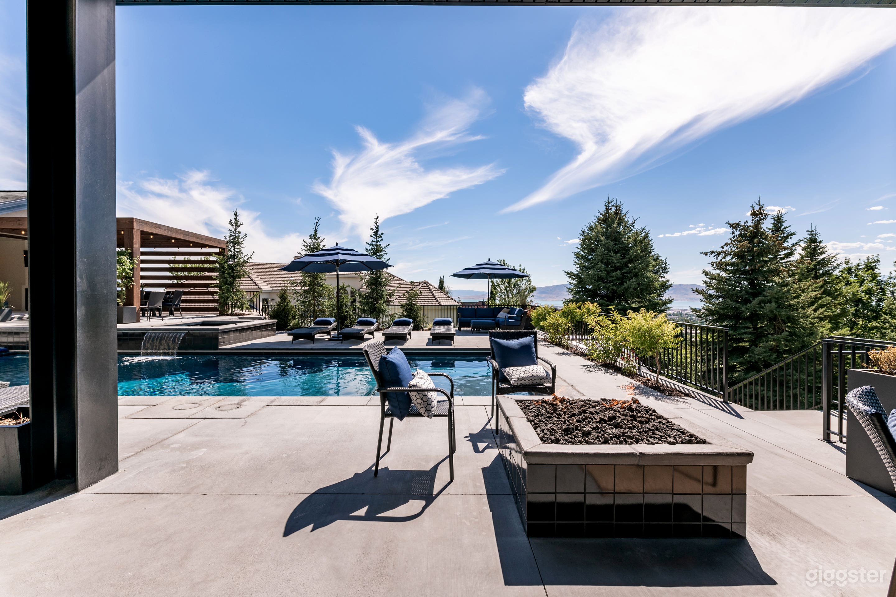 Firepit, pool, waterfall, spa on city view terrace