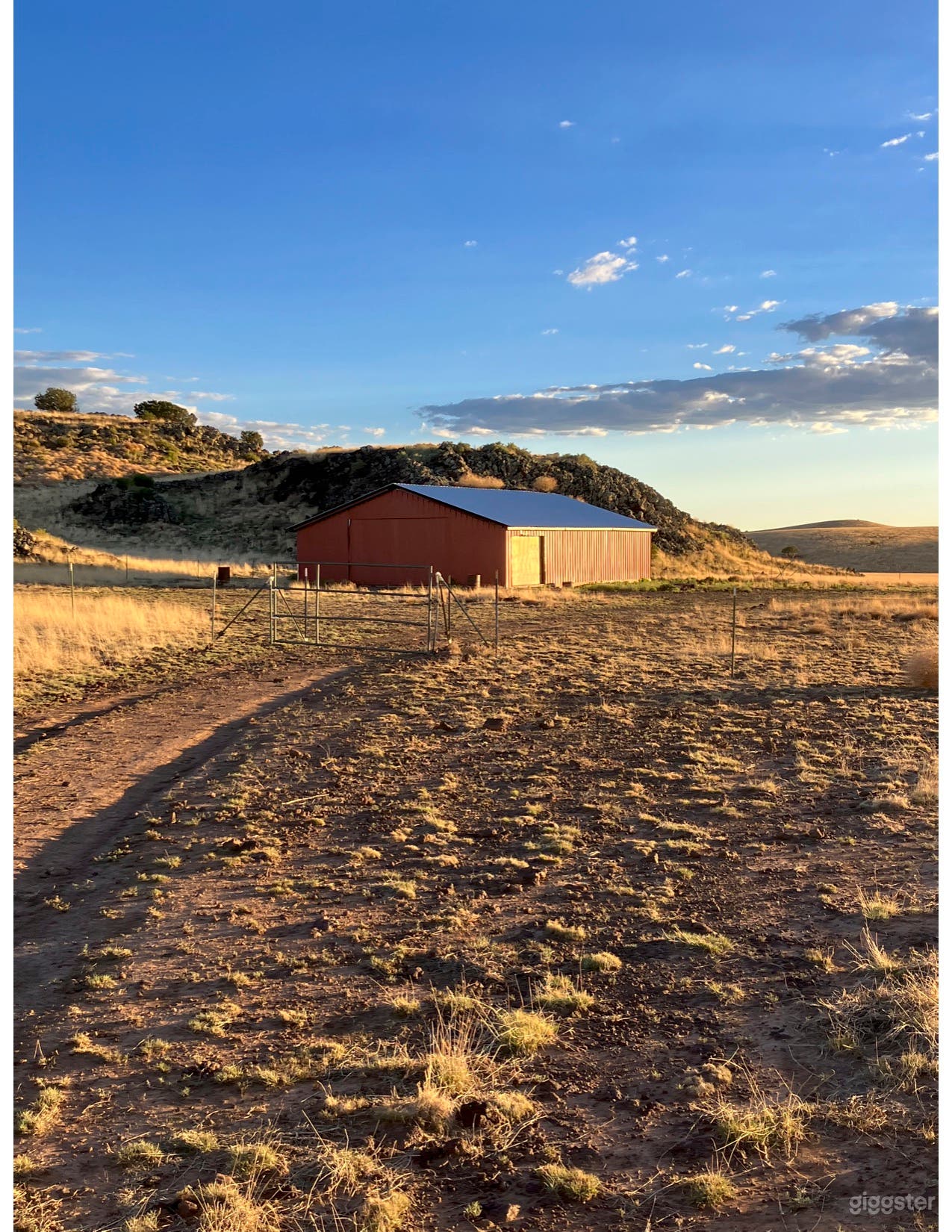 Barn and hills behind the  Palmer Ranch 