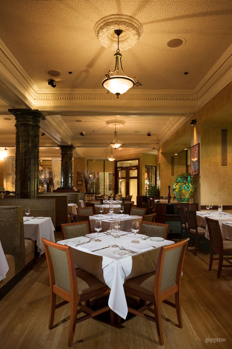  View east towards our corner set secondary entrance. Features double doors and two different alcove set tables.  