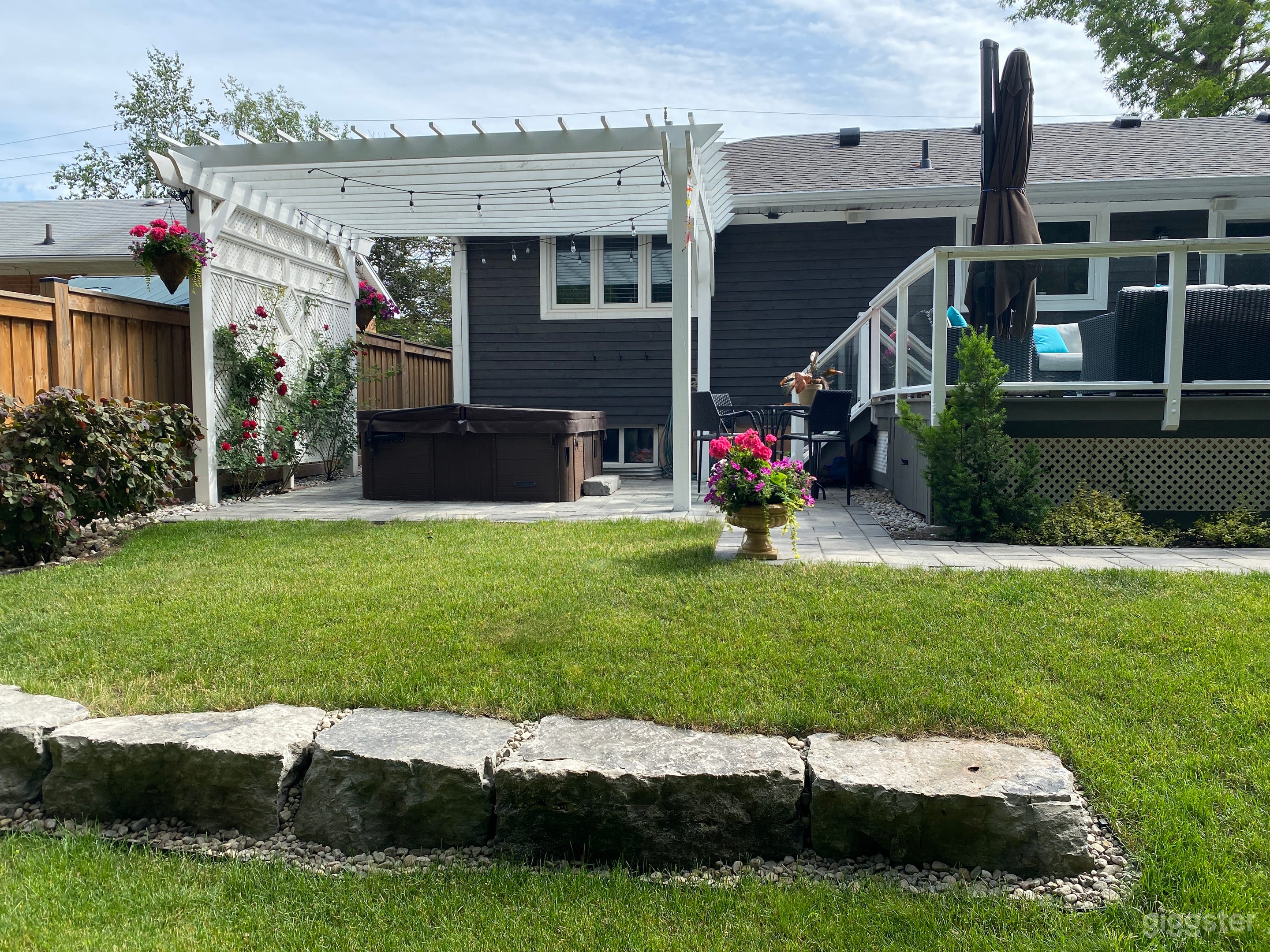 deck, hot tub and pergola