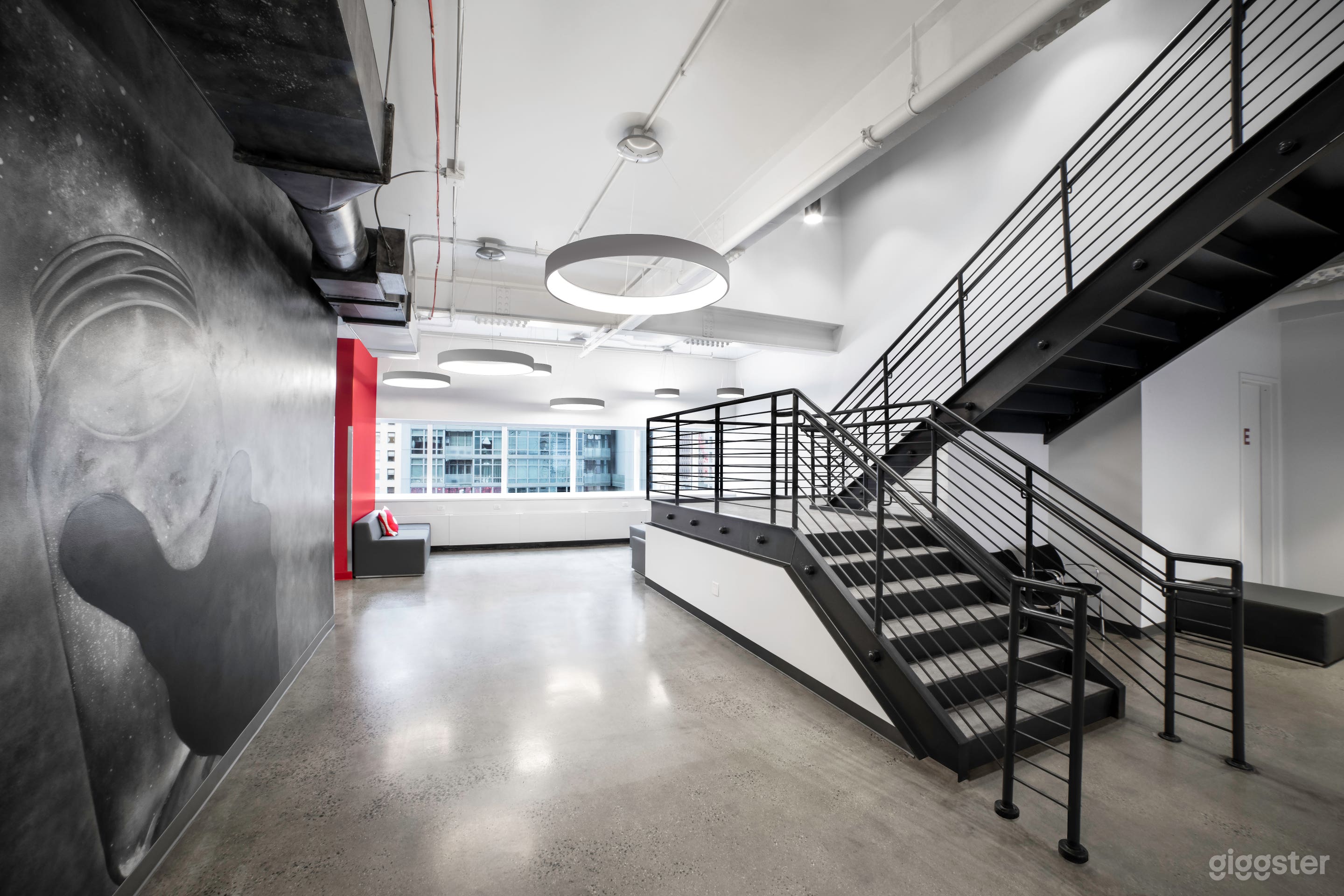 Complex features common area lounge with views of Times Square
