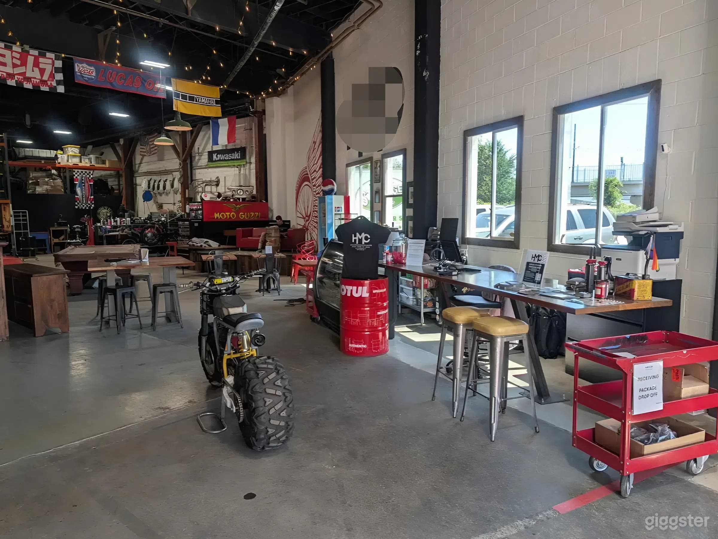 Industrial Motorcycle Workshop and Community Lounge Photo 3