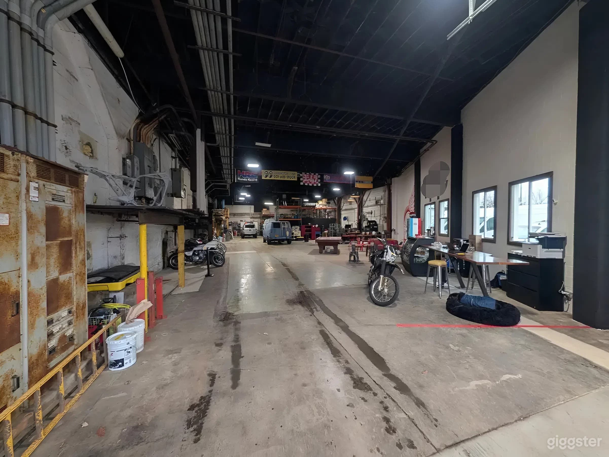 Industrial Motorcycle Workshop and Community Lounge Photo 2