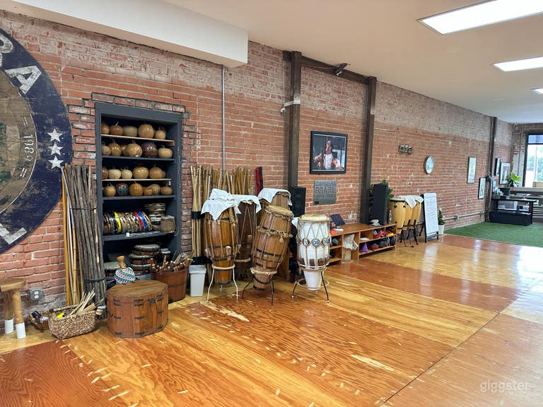 About 800 SF of sprung wood training floor, sound system, bench with kick pads and shelving 