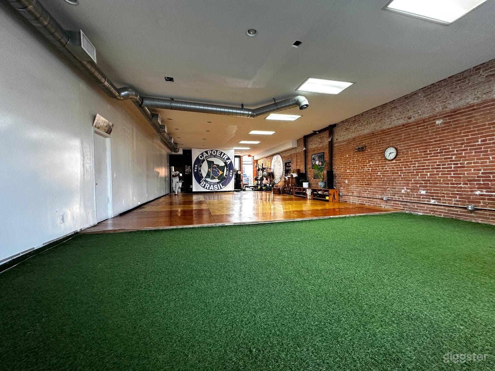 375 SF of artificial turf dedicated training area, stretching area or extension of floor area