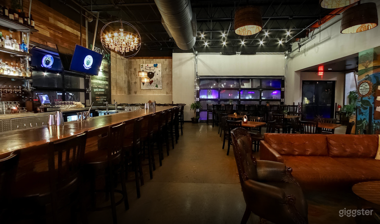 Indoor Dining Space with Bar and Music Stage Photo 3