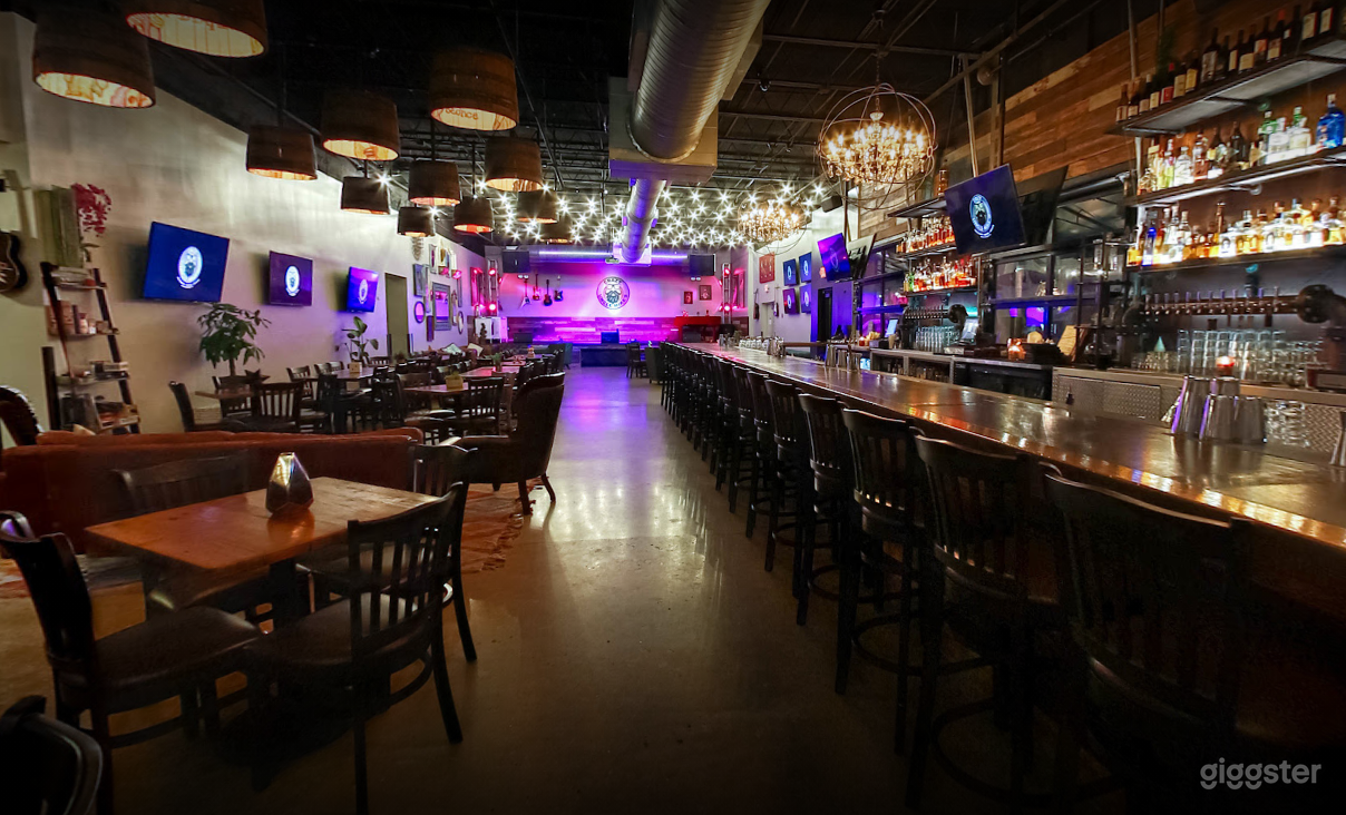 Indoor Dining Space with Bar and Music Stage Photo 4