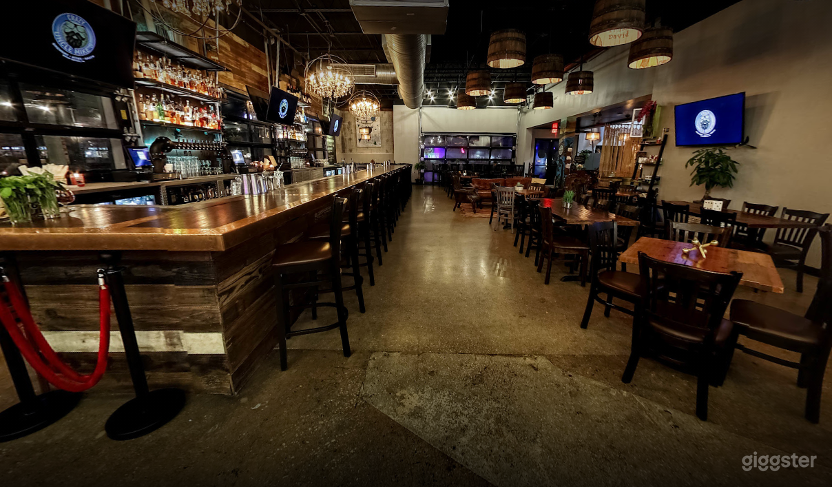 Indoor Dining Space with Bar and Music Stage Photo 2