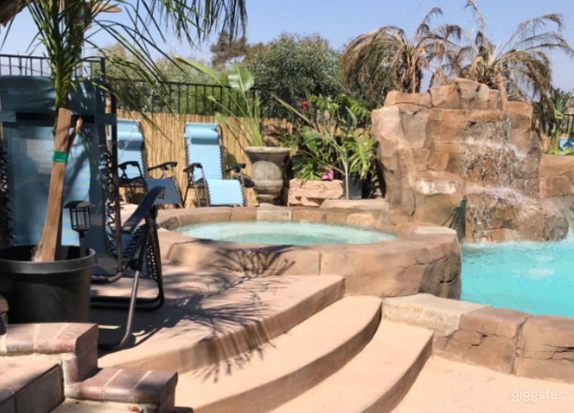 Rock Formation Pool with Heated Spa Photo 4