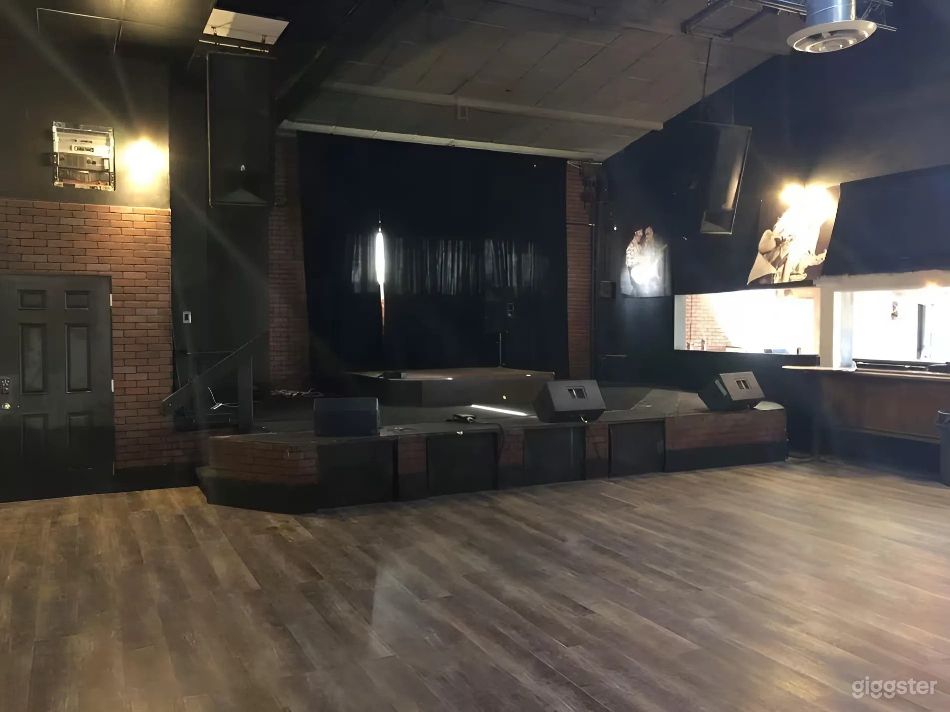 Versatile Live Music Venue with 2 Stages, Bar &amp; Patio (B Photo 1