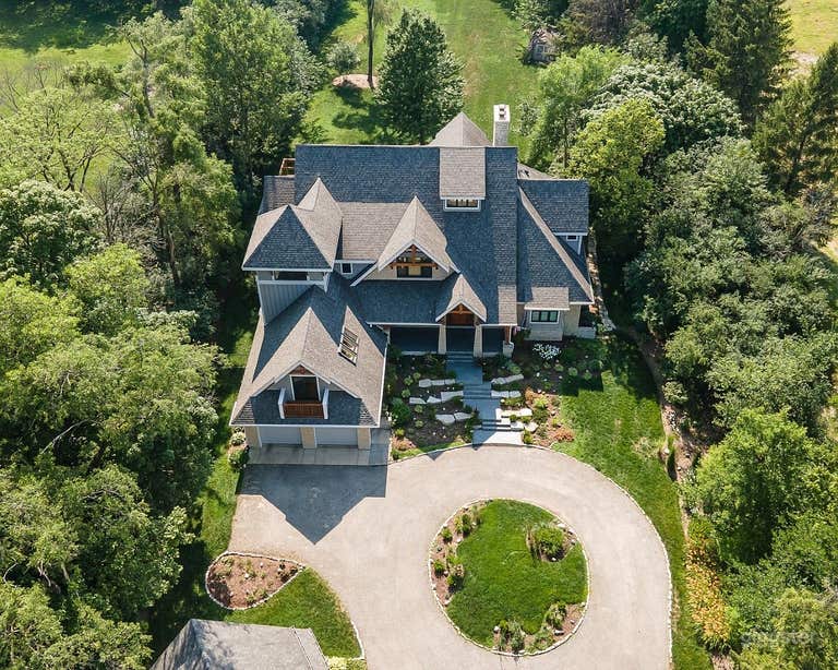  Mature trees surround this property providing privacy, and views of nature and recreational space and calm from the outside world. 