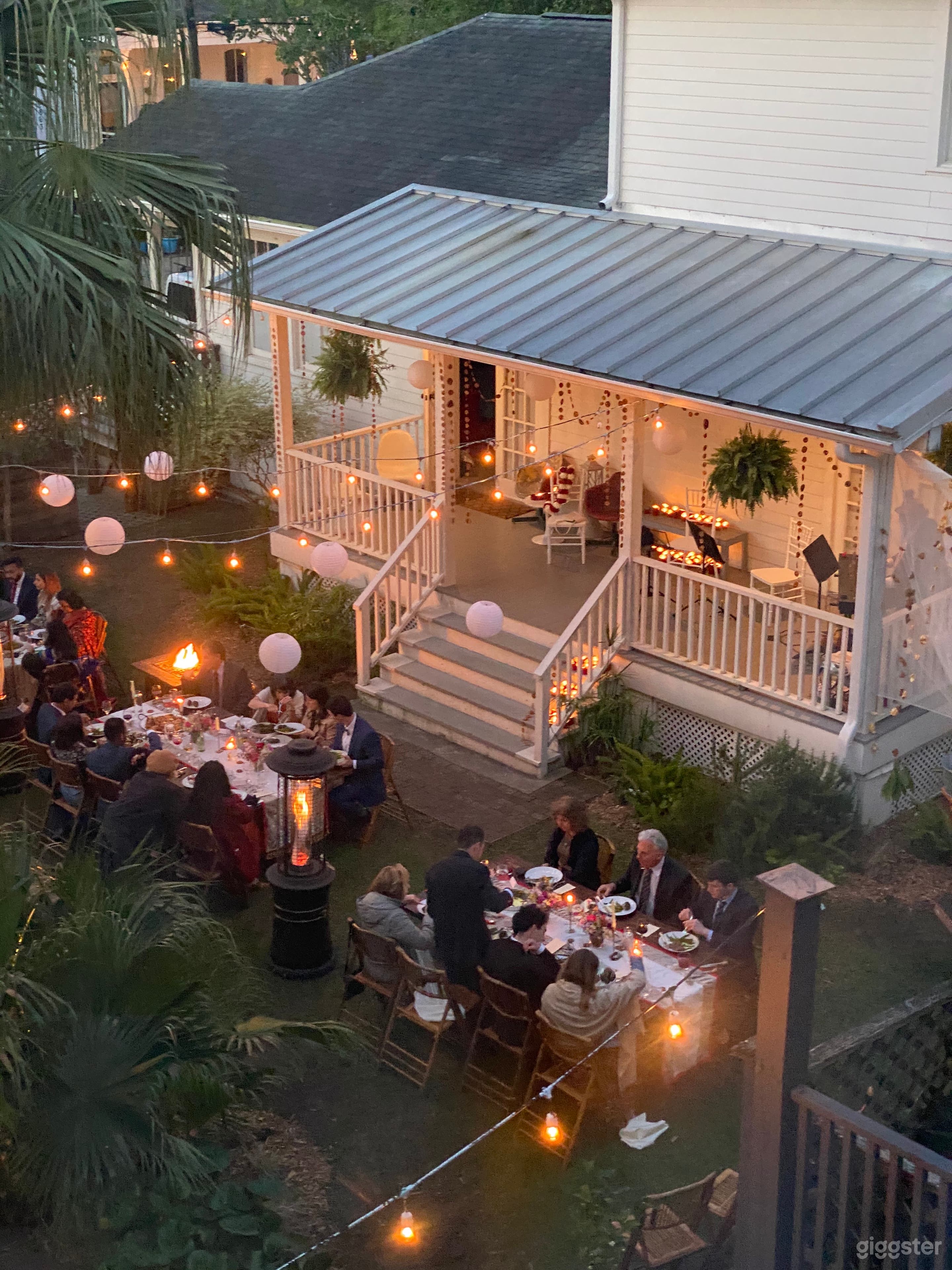 Charming guest house providing additional kitchen, bathrooms and lodging for out-of-town guests attending New Orleans garden celebrations.