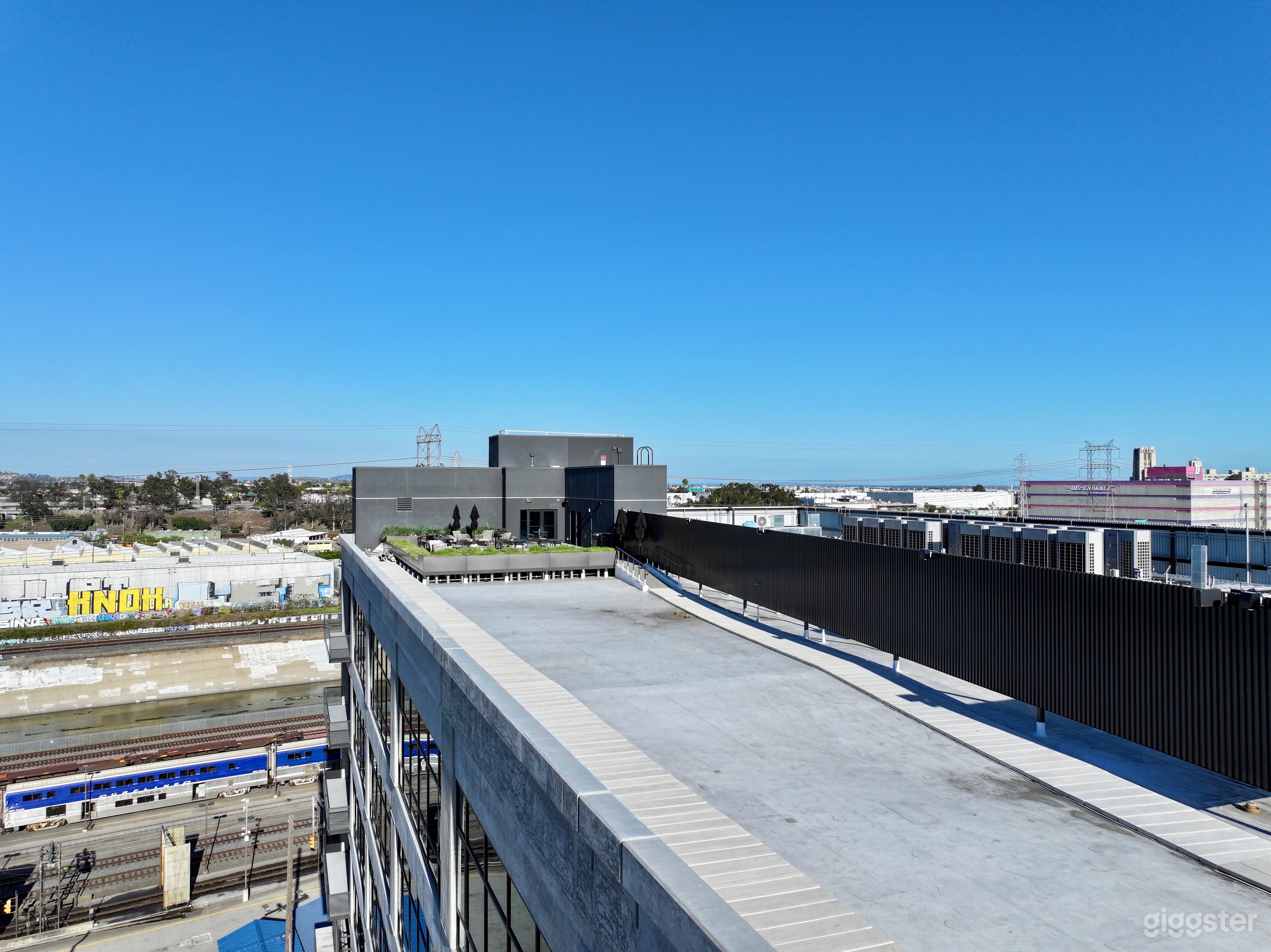 Luxury Rooftop Lounge Space w/ Skyline View Photo 4