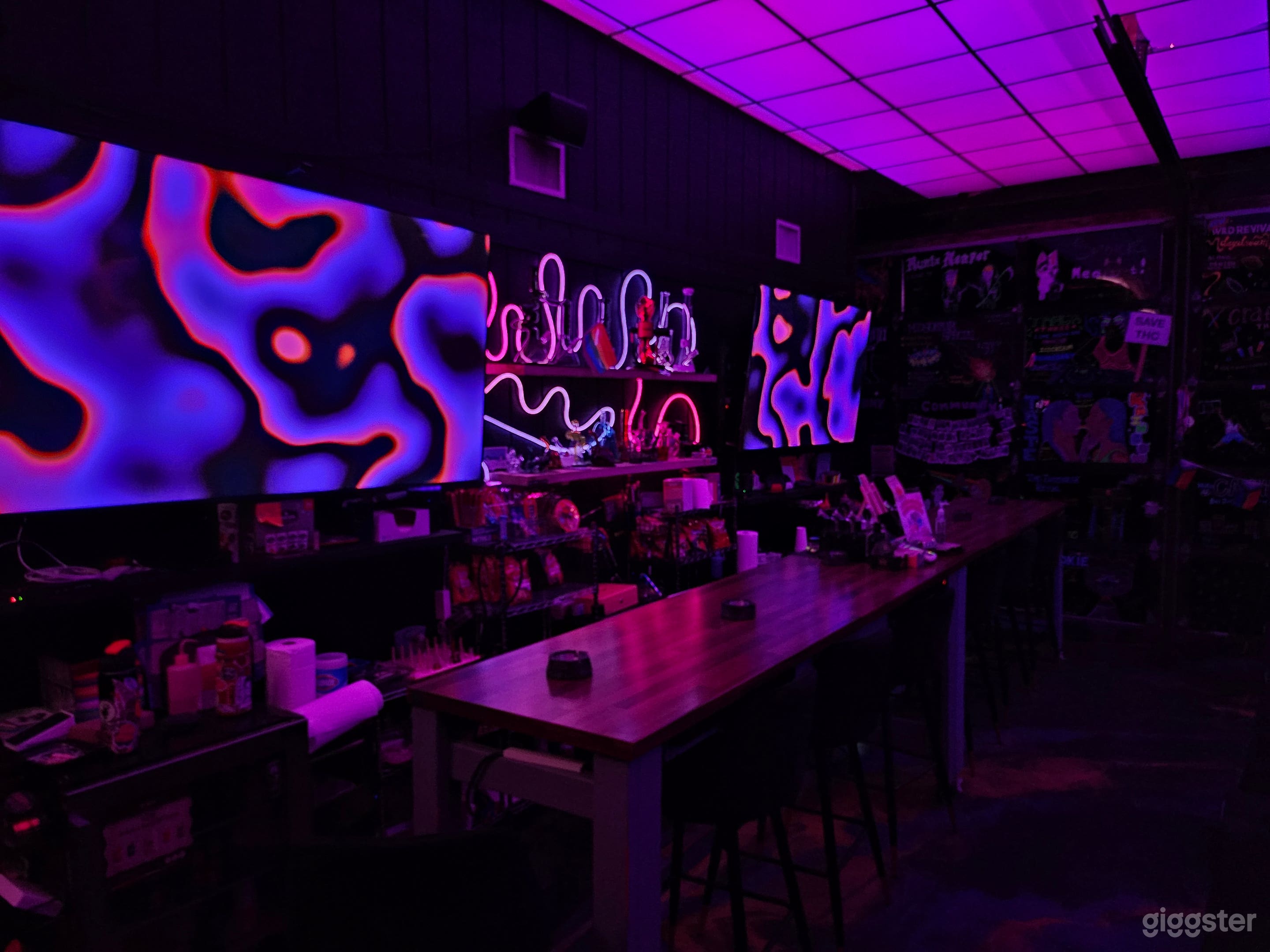 Downtown neon-lit lounge with a modern, immersive atmosphere Photo 2