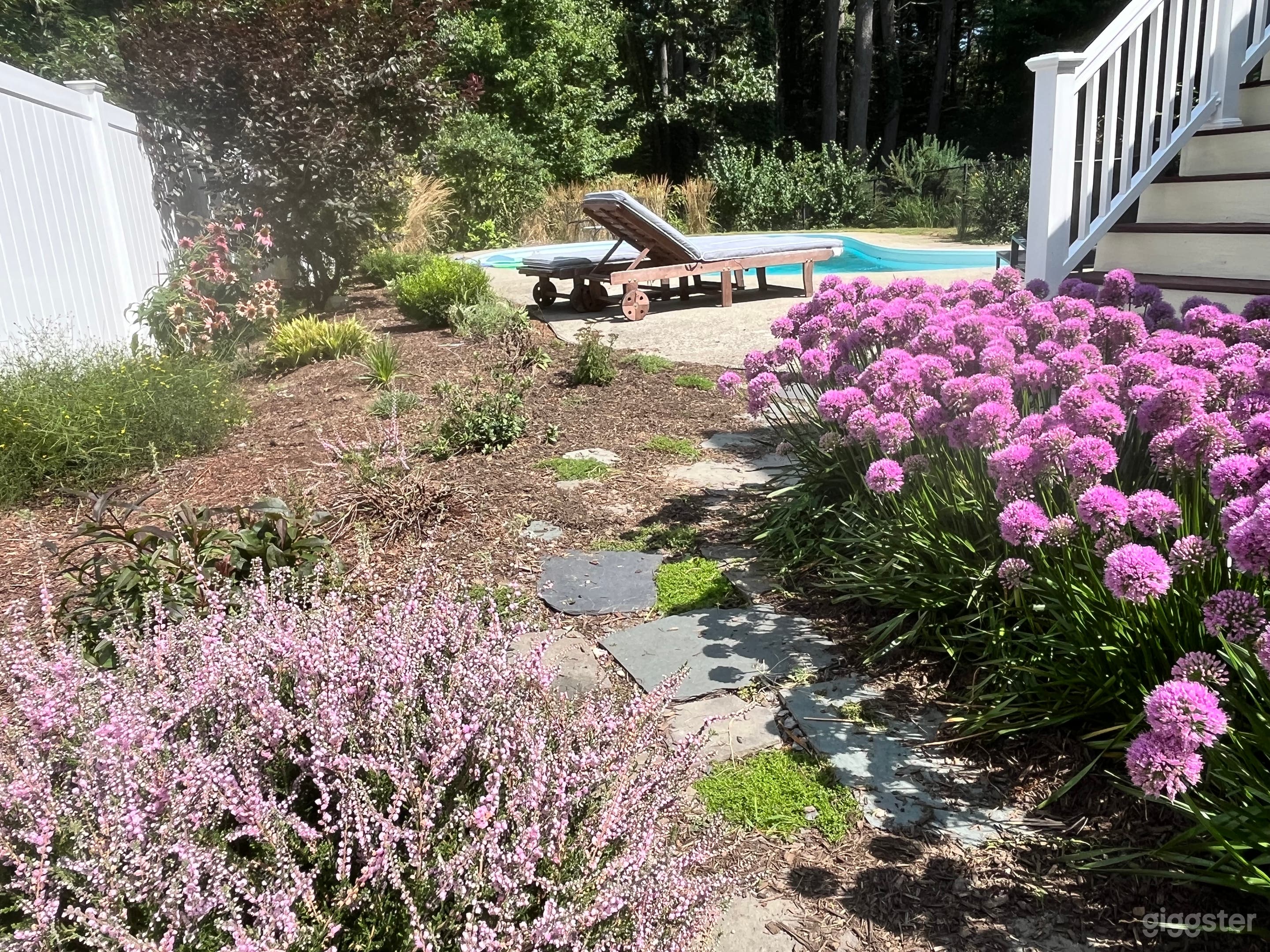 Serene English Garden Pool with Three-Season Porch Photo 4