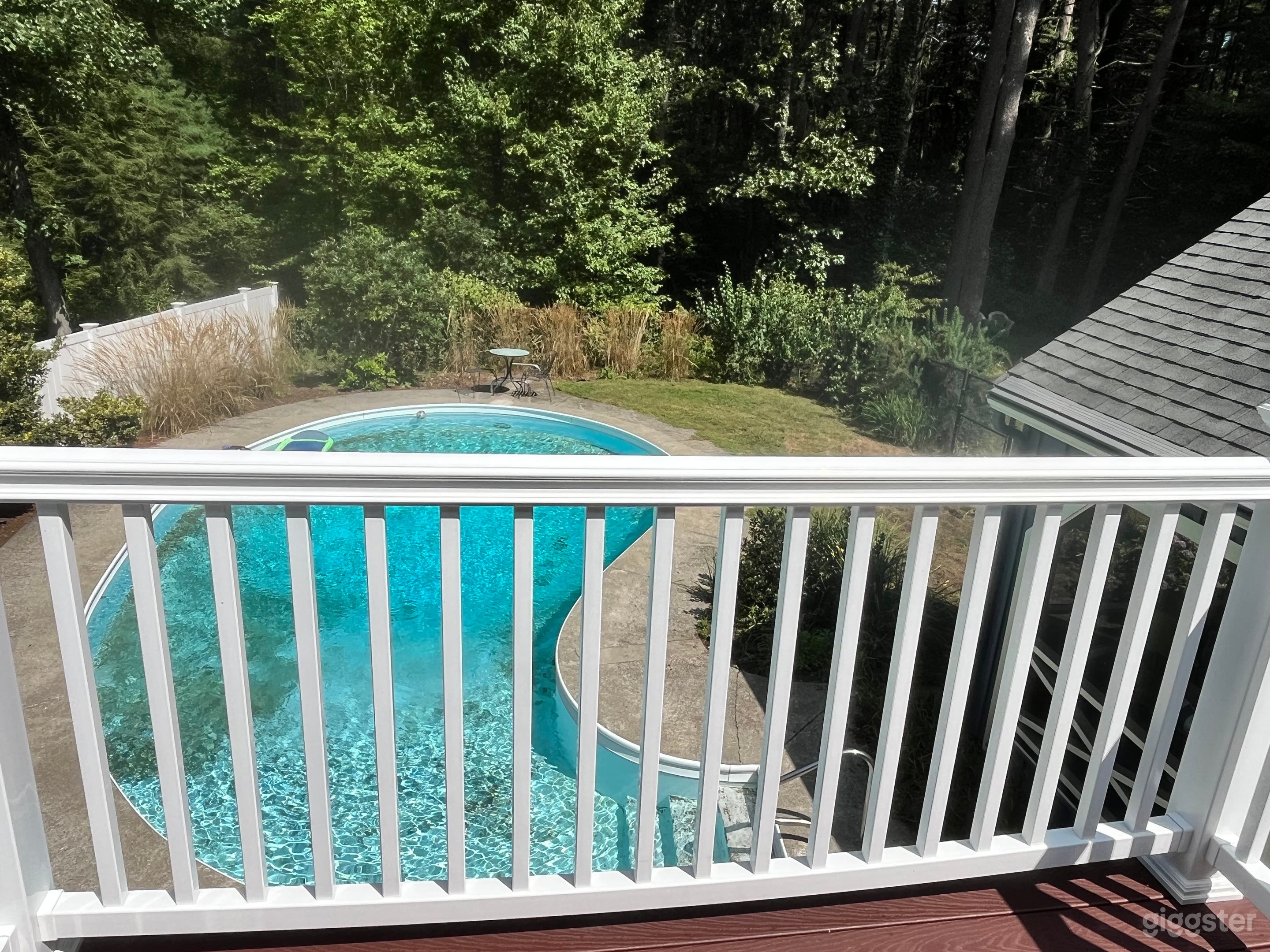 Serene English Garden Pool with Three-Season Porch Photo 3