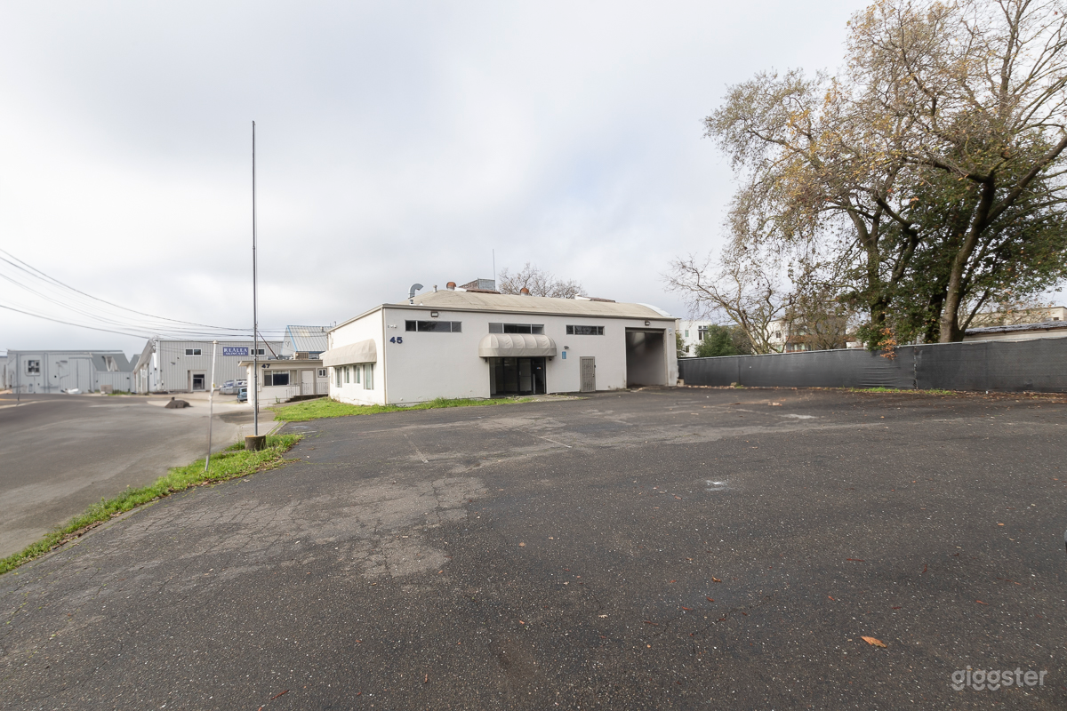 Ample parking lot and warehouse