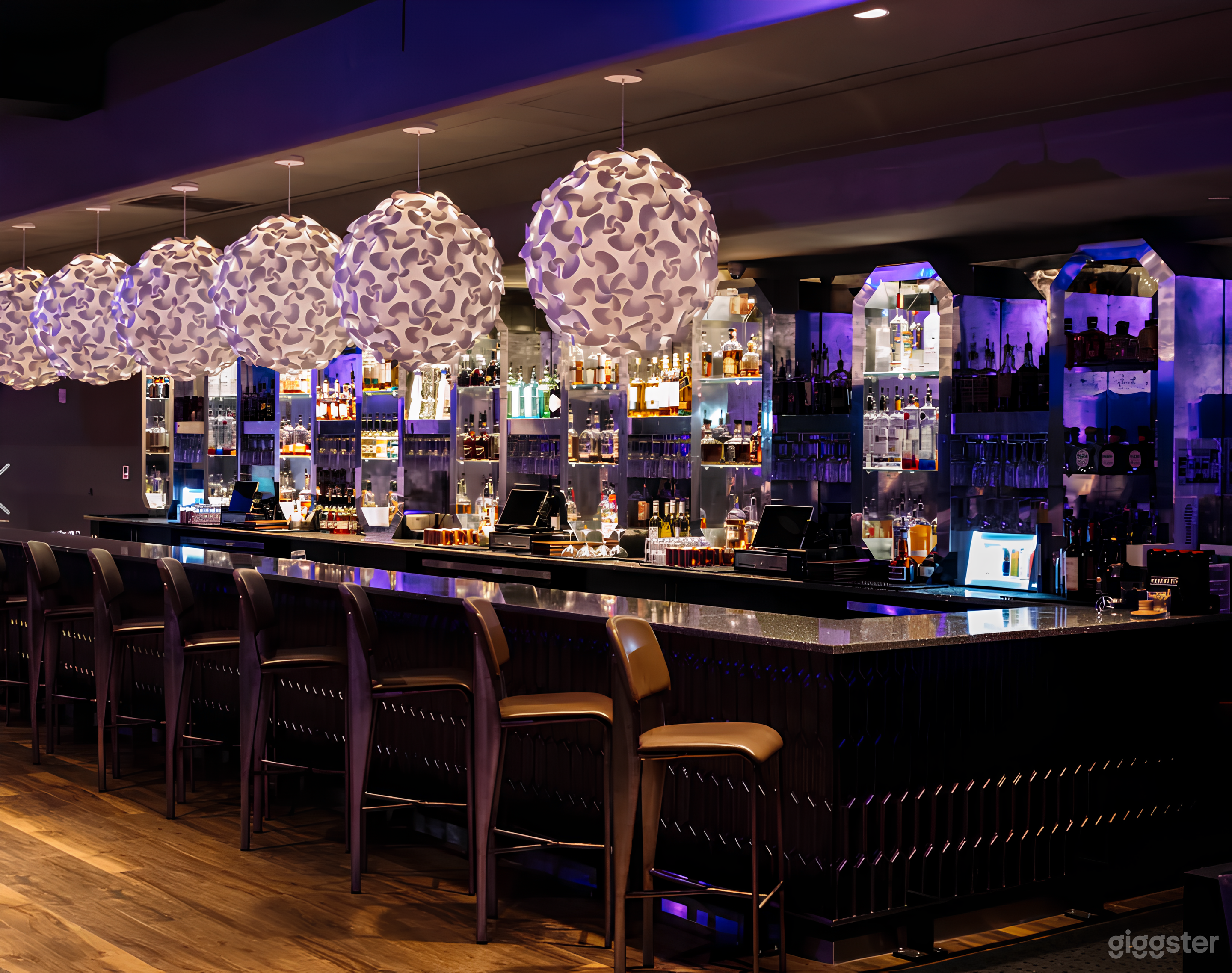 Vibrant Chic Lounge with Bar Photo 3