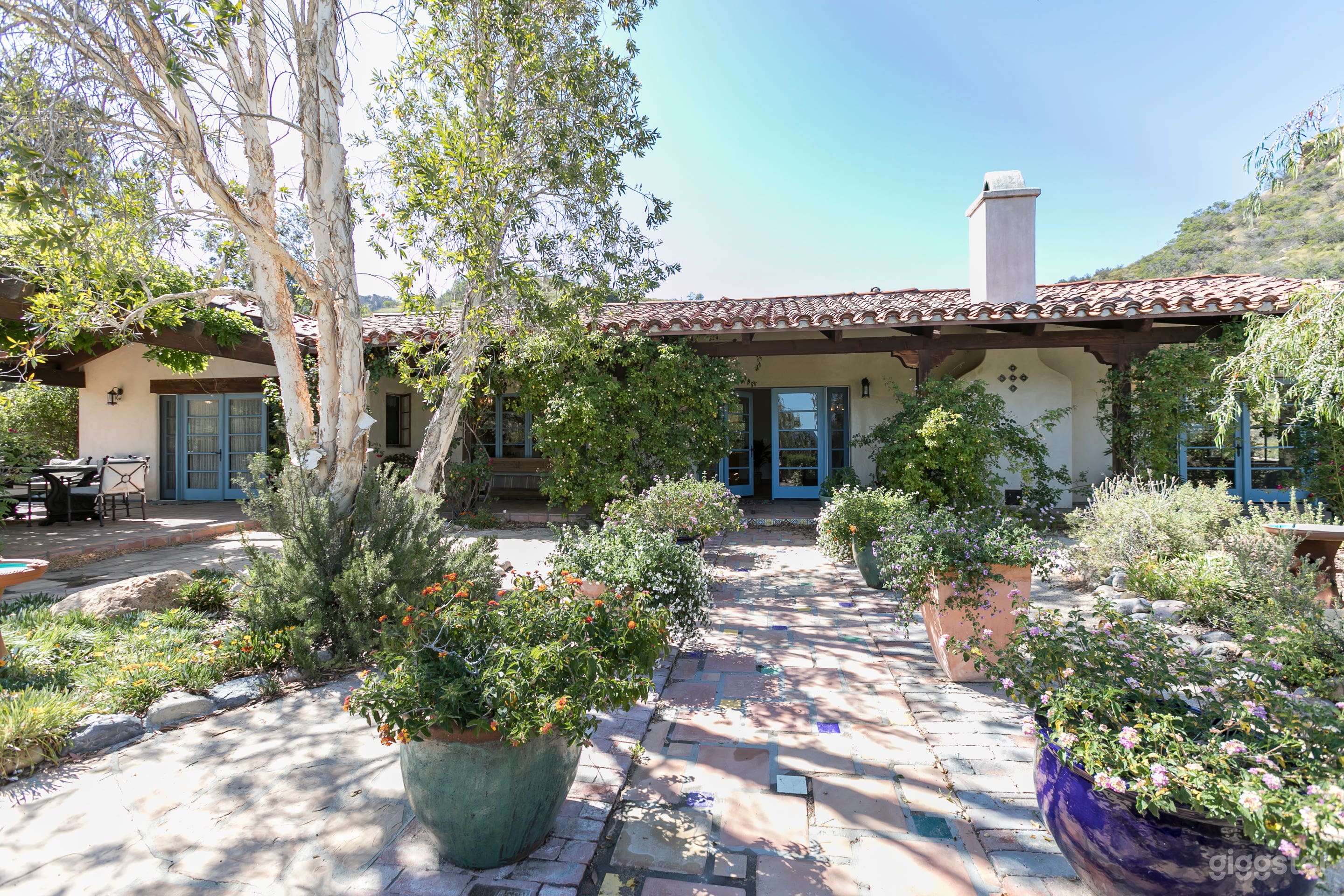 Spanish-Style Horse Ranch With Pool and View Photo 1