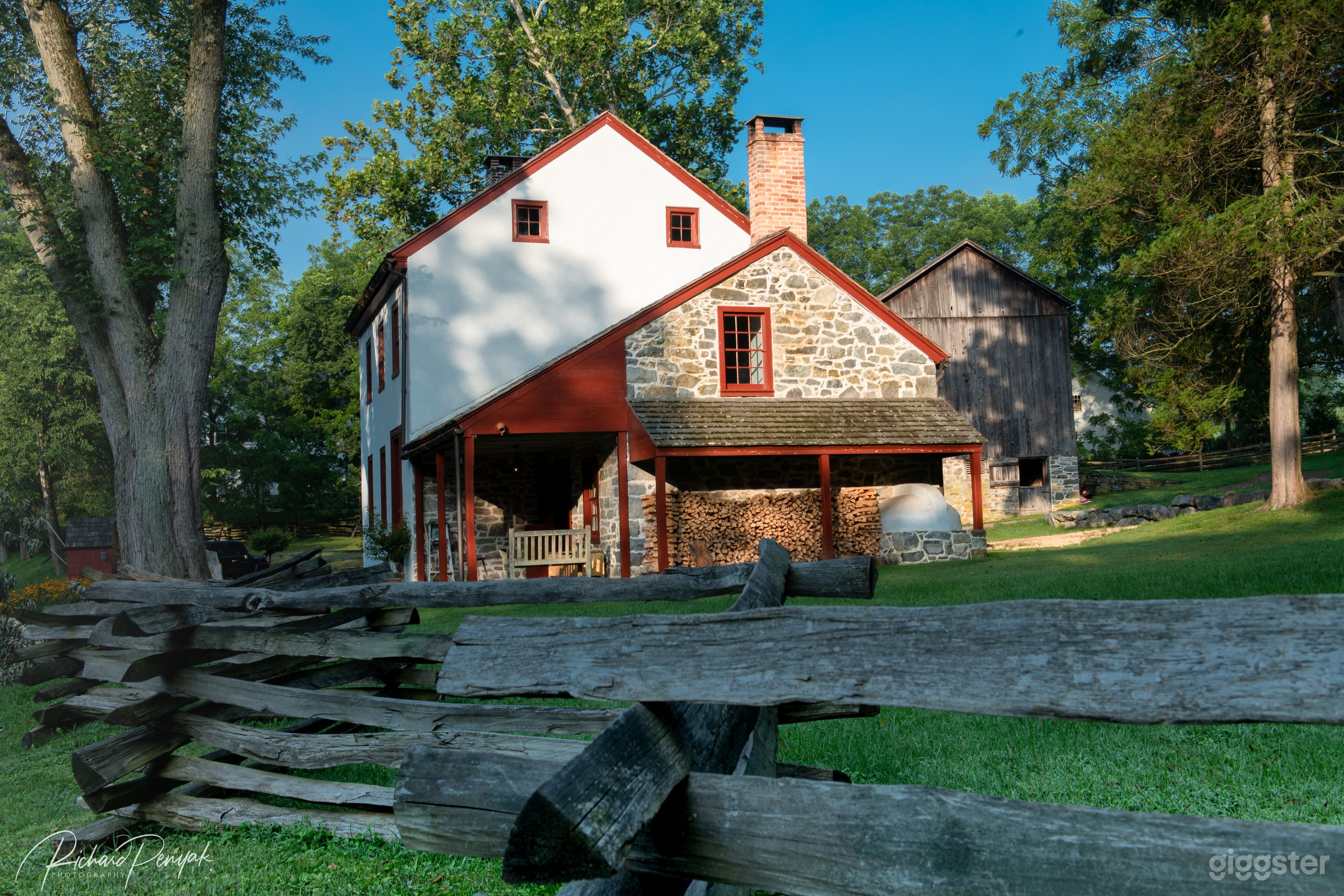 East side highlighting original 18th century house with added early 19th century plastered stone structure.