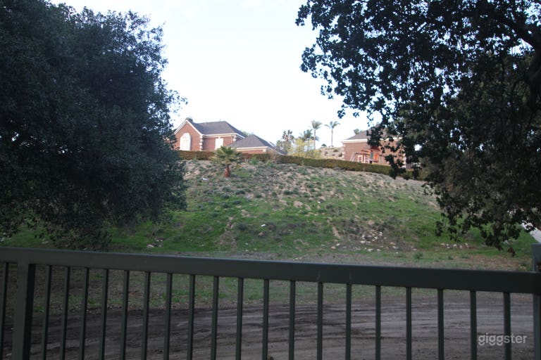  View from the South property gate 16 ft wide that is access inside the lower portion of the property. 