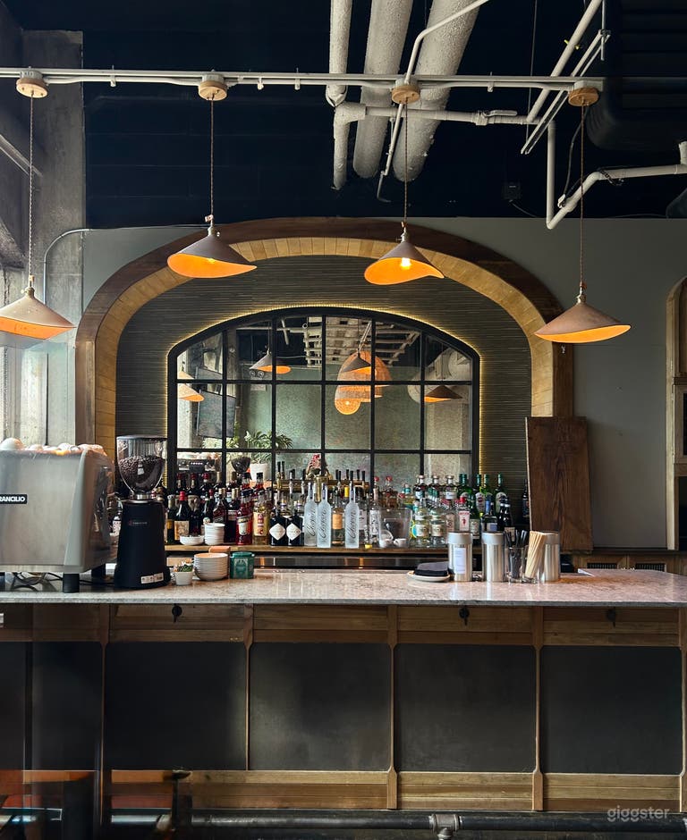  Charming Two-Story Restaurant with Arched Windows & Art Wall 