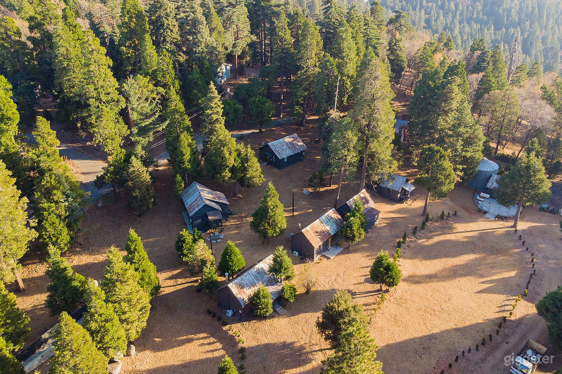 Secluded 4+ acres with barn, 12 cabins, forested and open areas. 90 minutes from LA