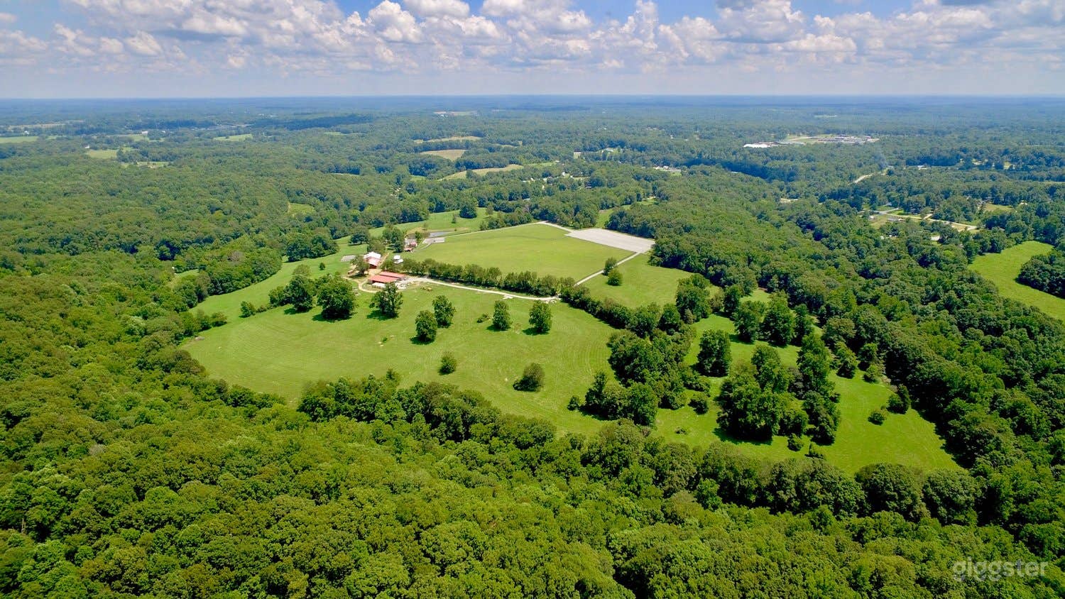 110 acre Farm with barn, log cabin, creeks &amp; more Photo 1