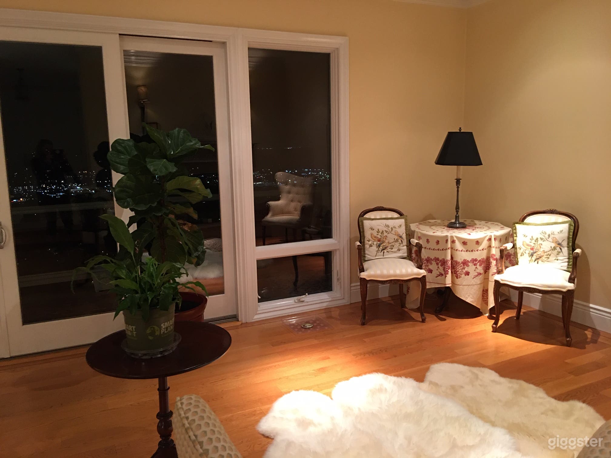 Corner of living room that looks out to bay on deck