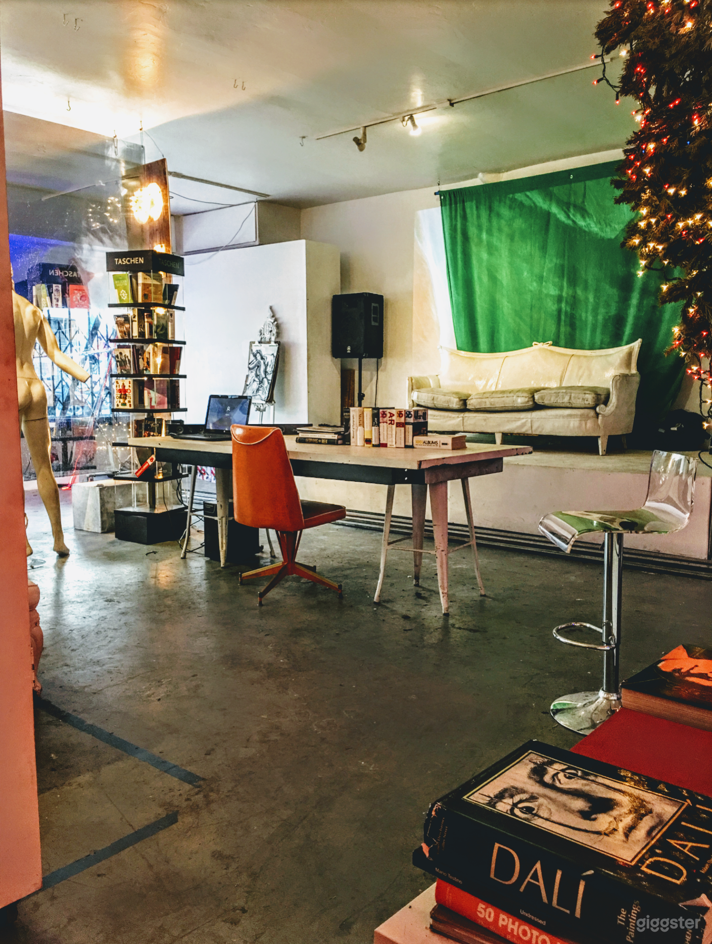 Main Studio Area/Art Gallery with polished concrete floors and white walls. . All furniture and sets are moveable 