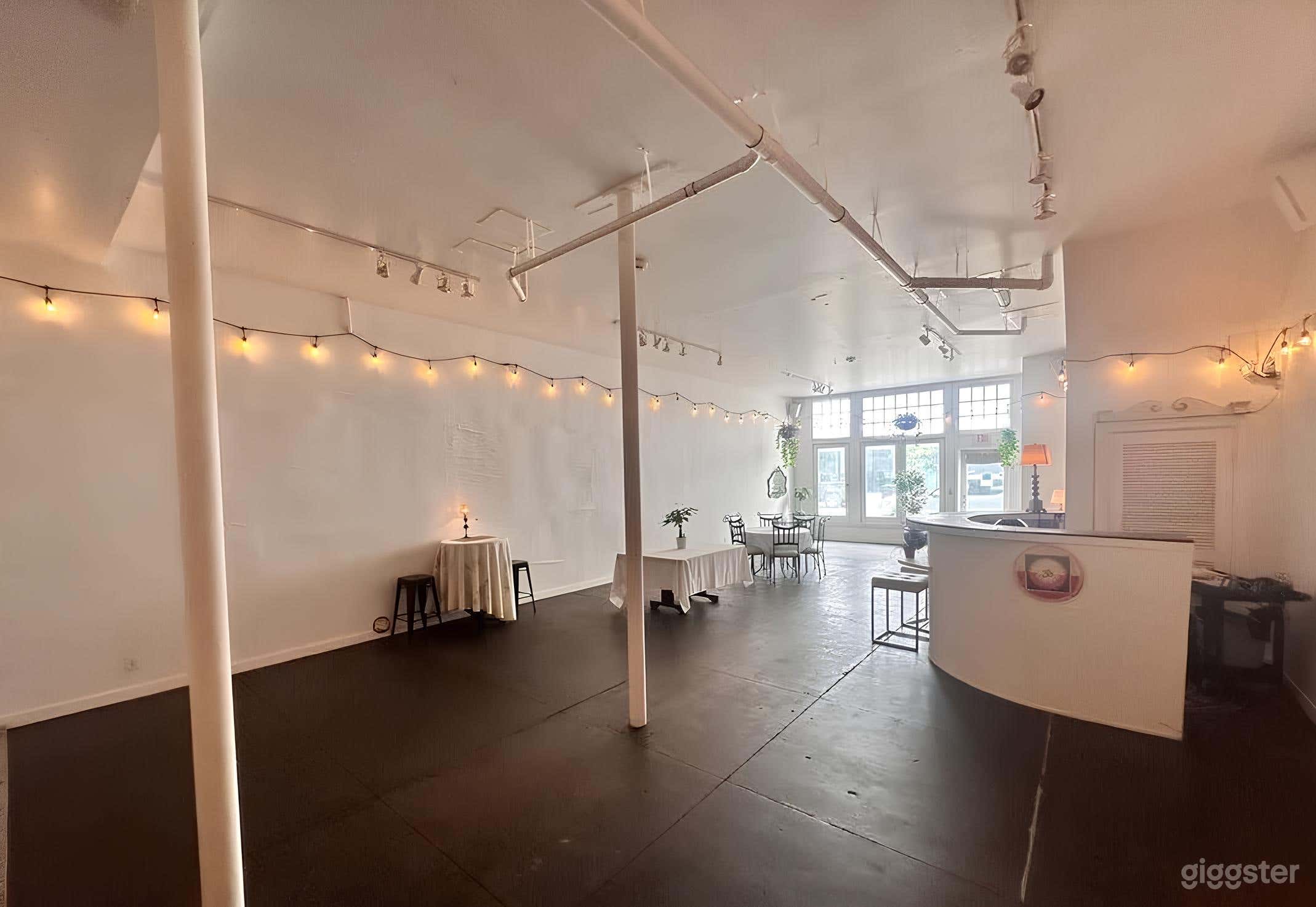 Front area has 15’ ceilings, built in bar/reception desk, and open floor plan.
Customize decor to your needs.