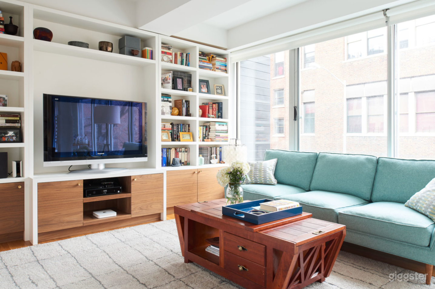 Living room with custom, built-in bookcase.
