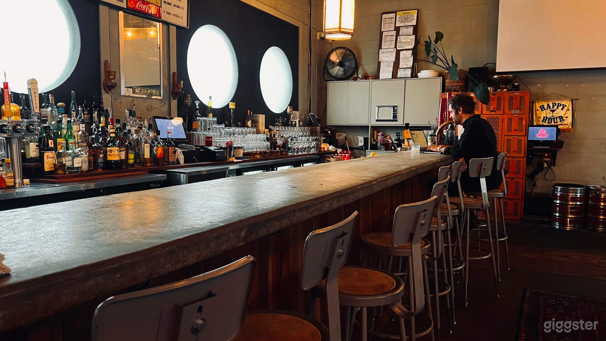 Eclectic Industrial Neighborhood Bar with Patio Photo 3