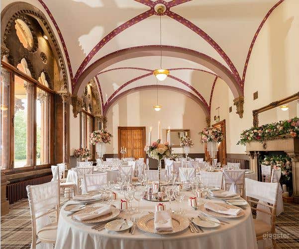 The Dining Room with Rich Decoration and Fireplace Photo 1